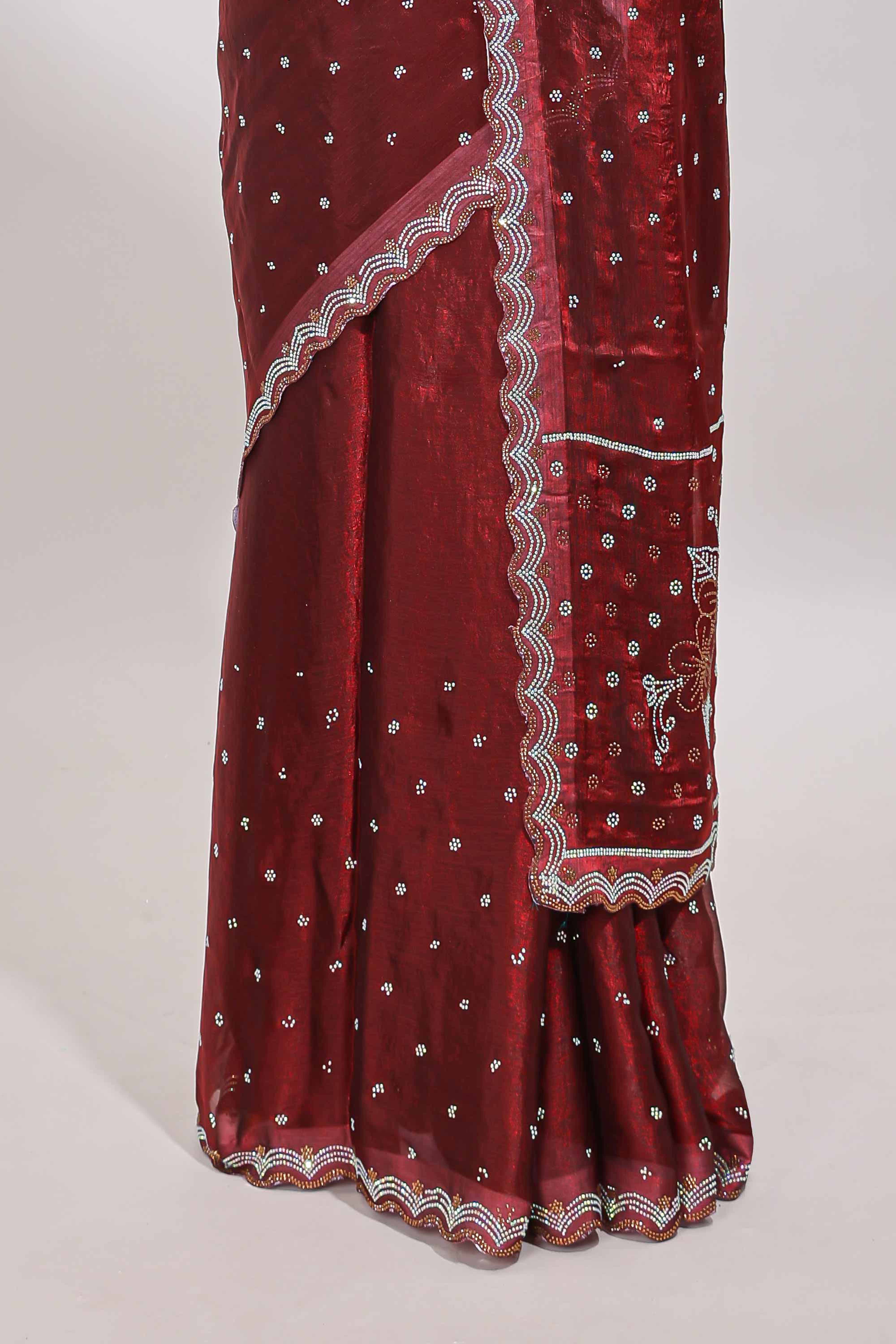 Maroon stone work floral motifs designer saree with self design scallop border and matching blouse