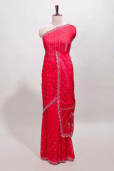 Pink stone work floral motifs designer saree with self design scallop border and matching blouse