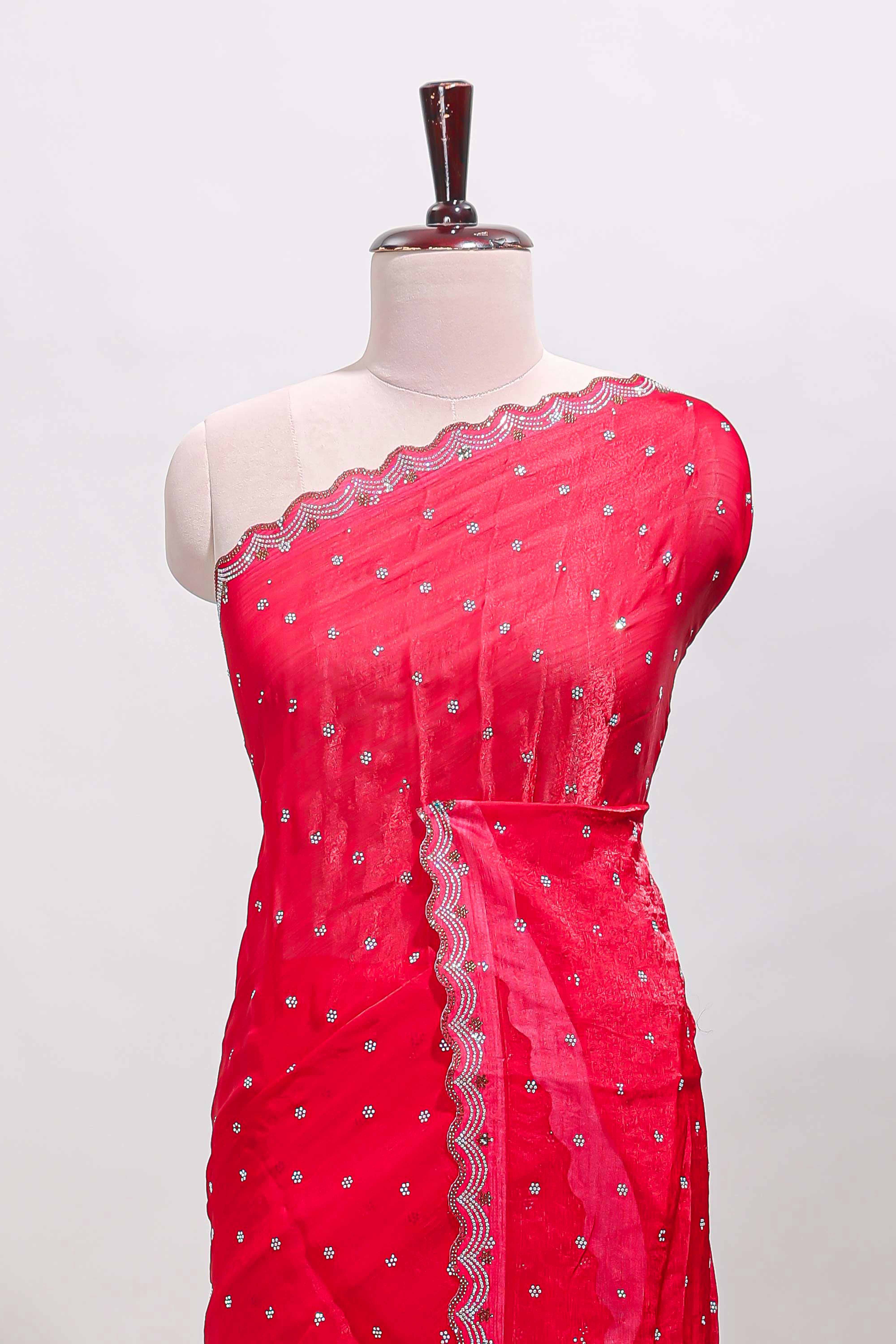 Pink stone work floral motifs designer saree with self design scallop border and matching blouse