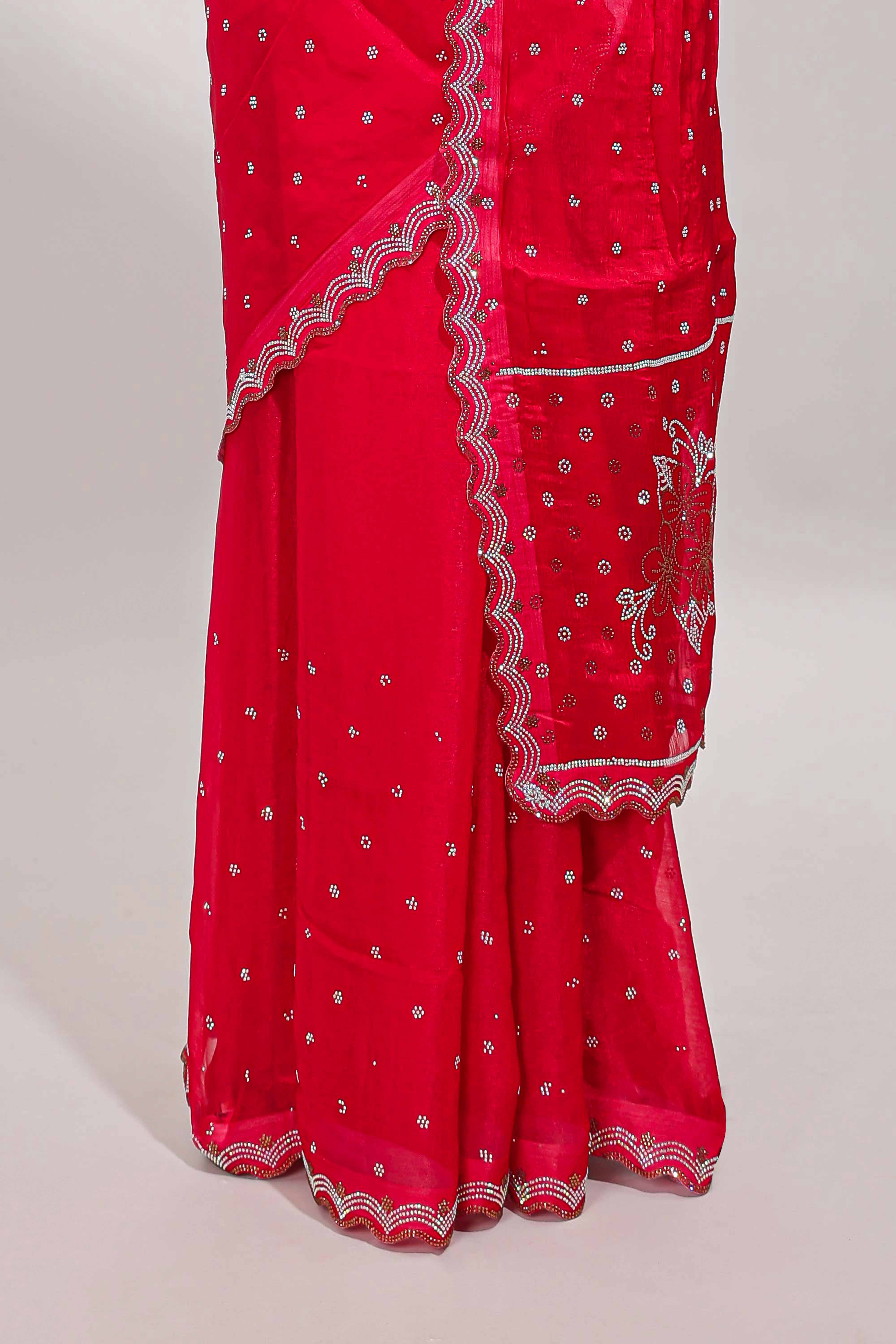Pink stone work floral motifs designer saree with self design scallop border and matching blouse