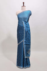 Midnight blue stone work floral motifs designer saree with self design scallop border and matching blouse
