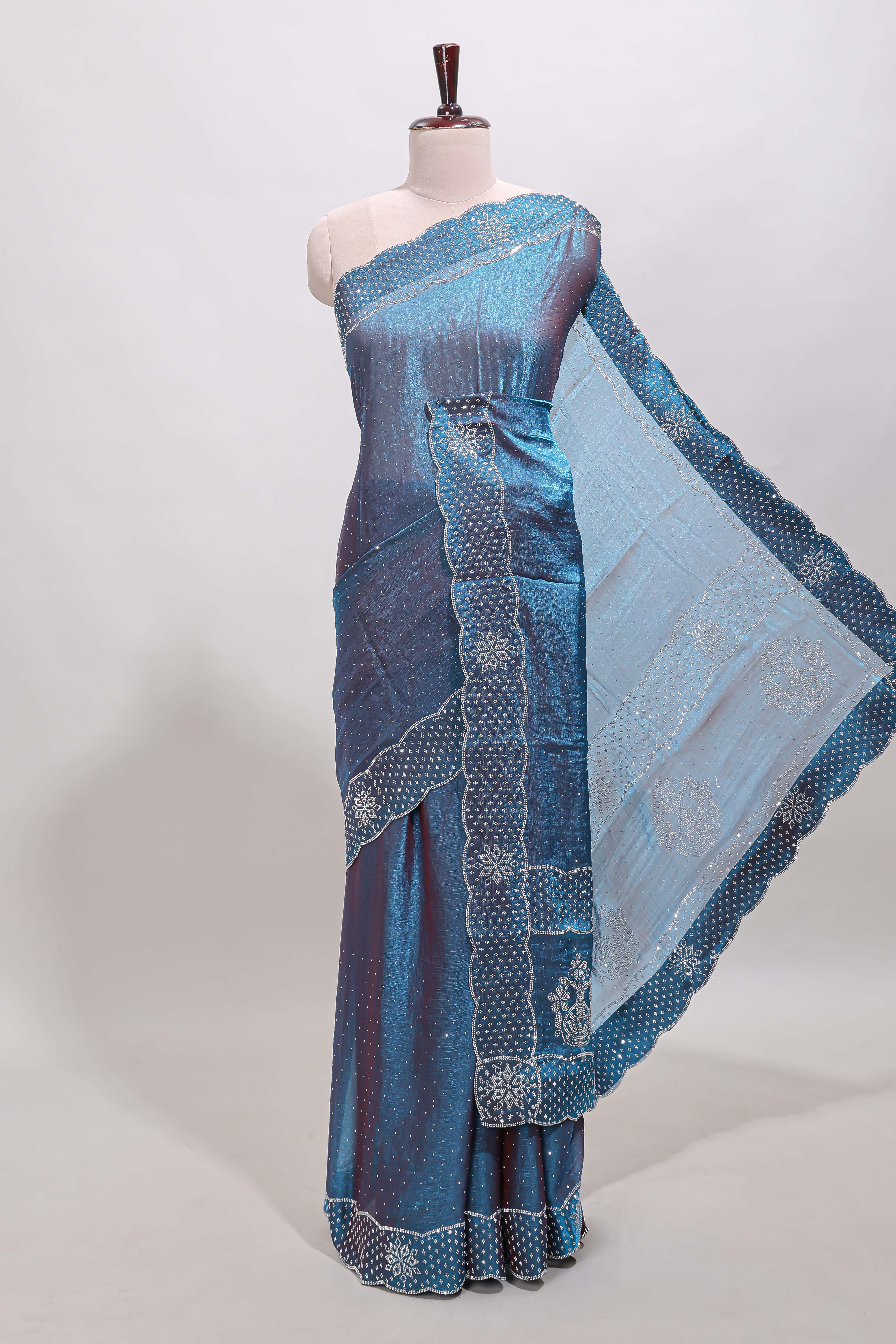Blue dotted stone work designer saree with self floral design scallop border and matching blouse