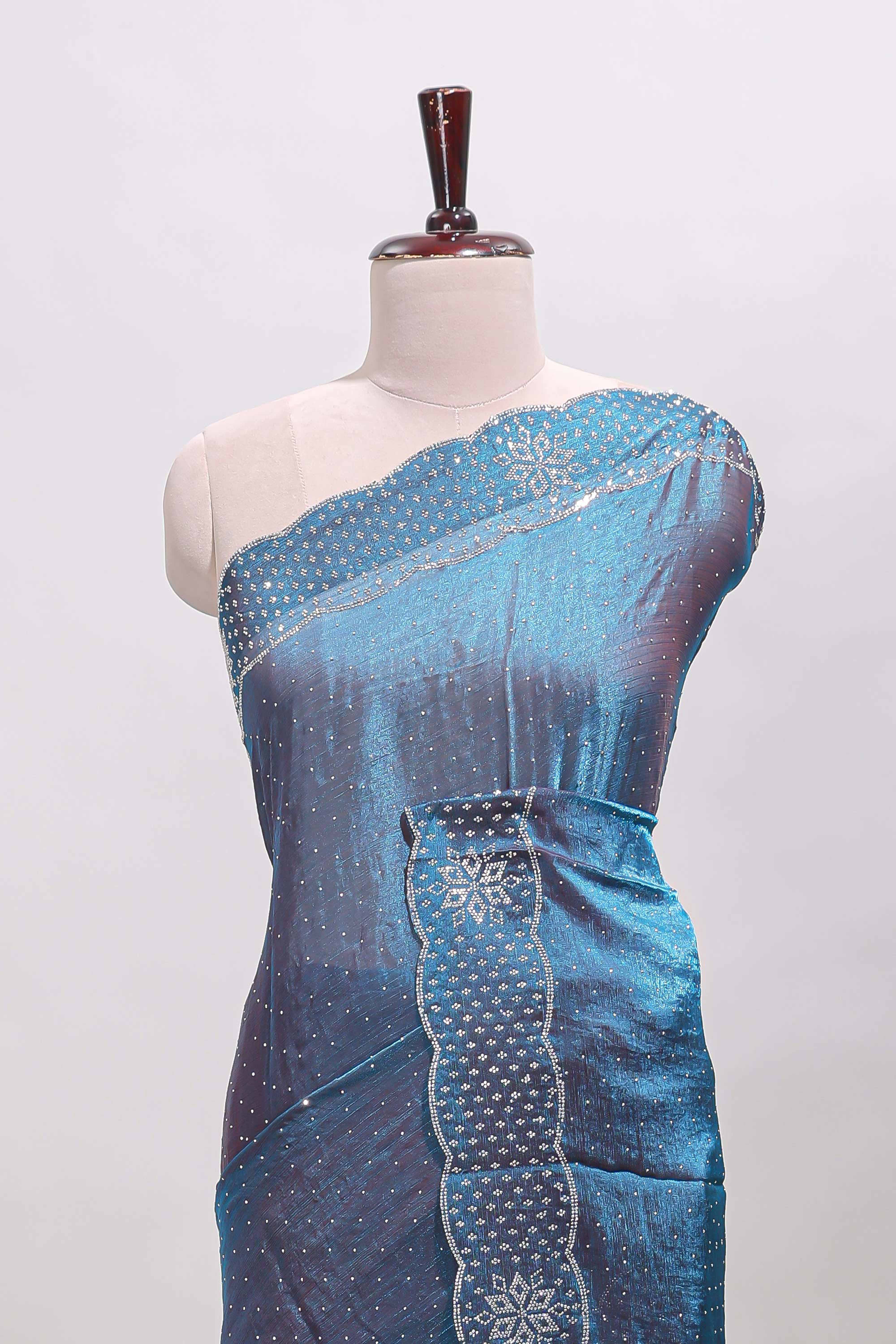 Blue dotted stone work designer saree with self floral design scallop border and matching blouse