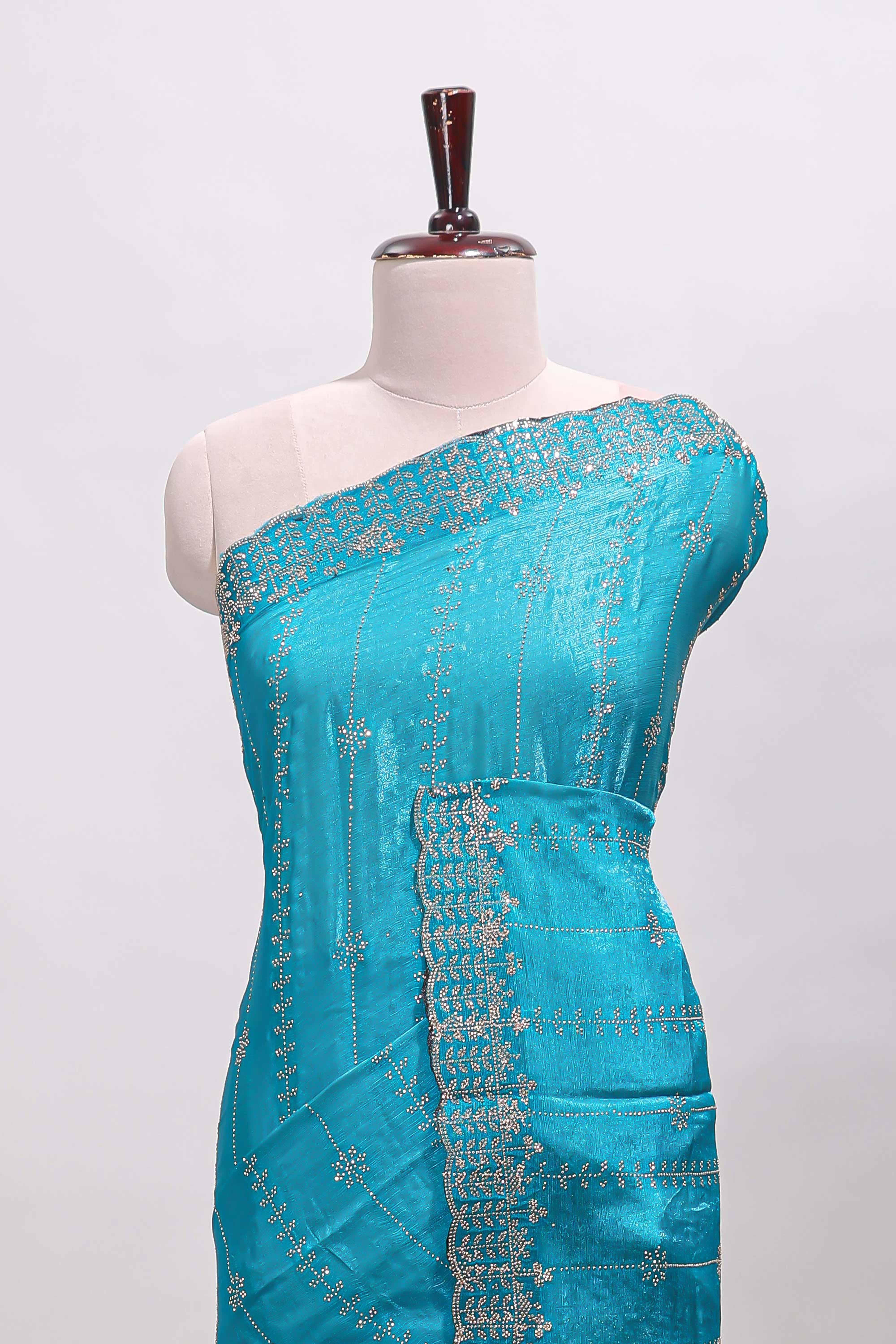 Blue striped floral design stone work designer saree with self scallop design border and matching blouse