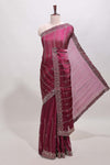 Purple striped floral design stone work designer saree with self scallop design border and matching blouse