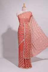 Coral pink saree with elegant silver sequin diamond embroidery featuring a shimmering border and pallu along with blouse