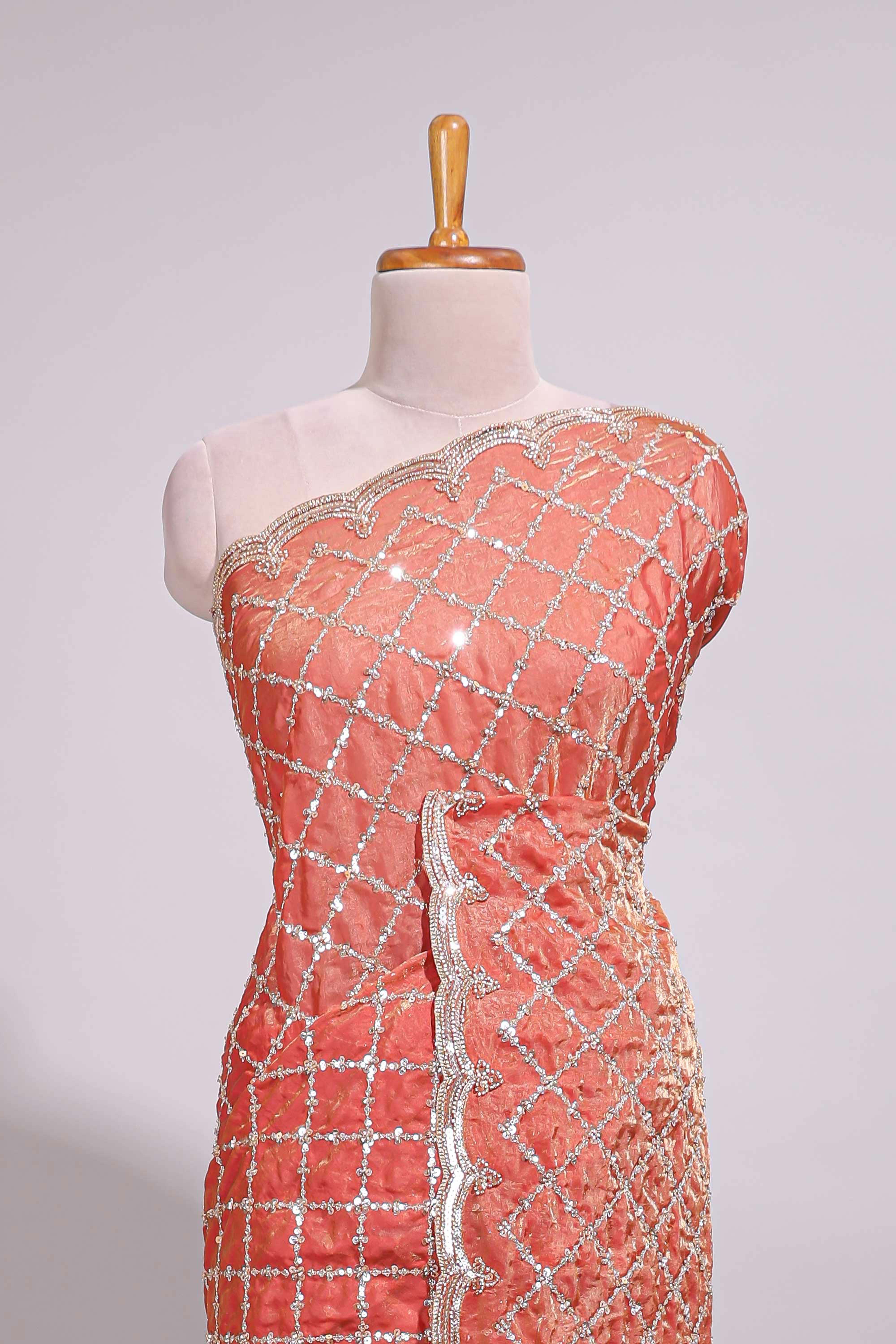 Coral pink saree with elegant silver sequin diamond embroidery featuring a shimmering border and pallu along with blouse