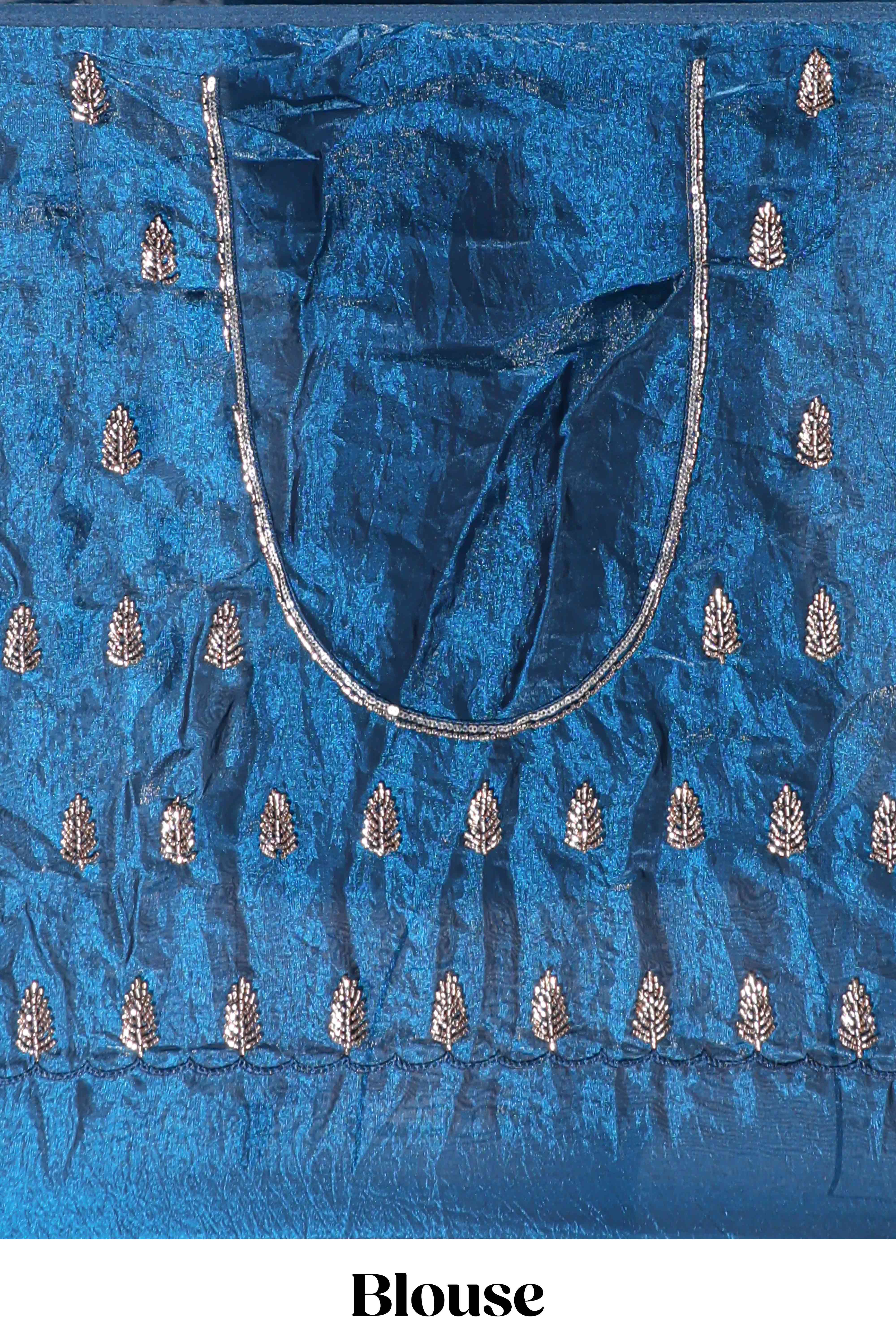 Royal blue saree with elegant golden floral embroidery and a rich embellished border along with embroidered blouse piece