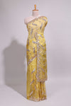 Lemon yellow saree with silver sequin abstract embroidery floral motifs and a shimmering embellished border along with matching blouse