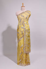 Lemon yellow saree with silver sequin abstract embroidery floral motifs and a shimmering embellished border along with matching blouse