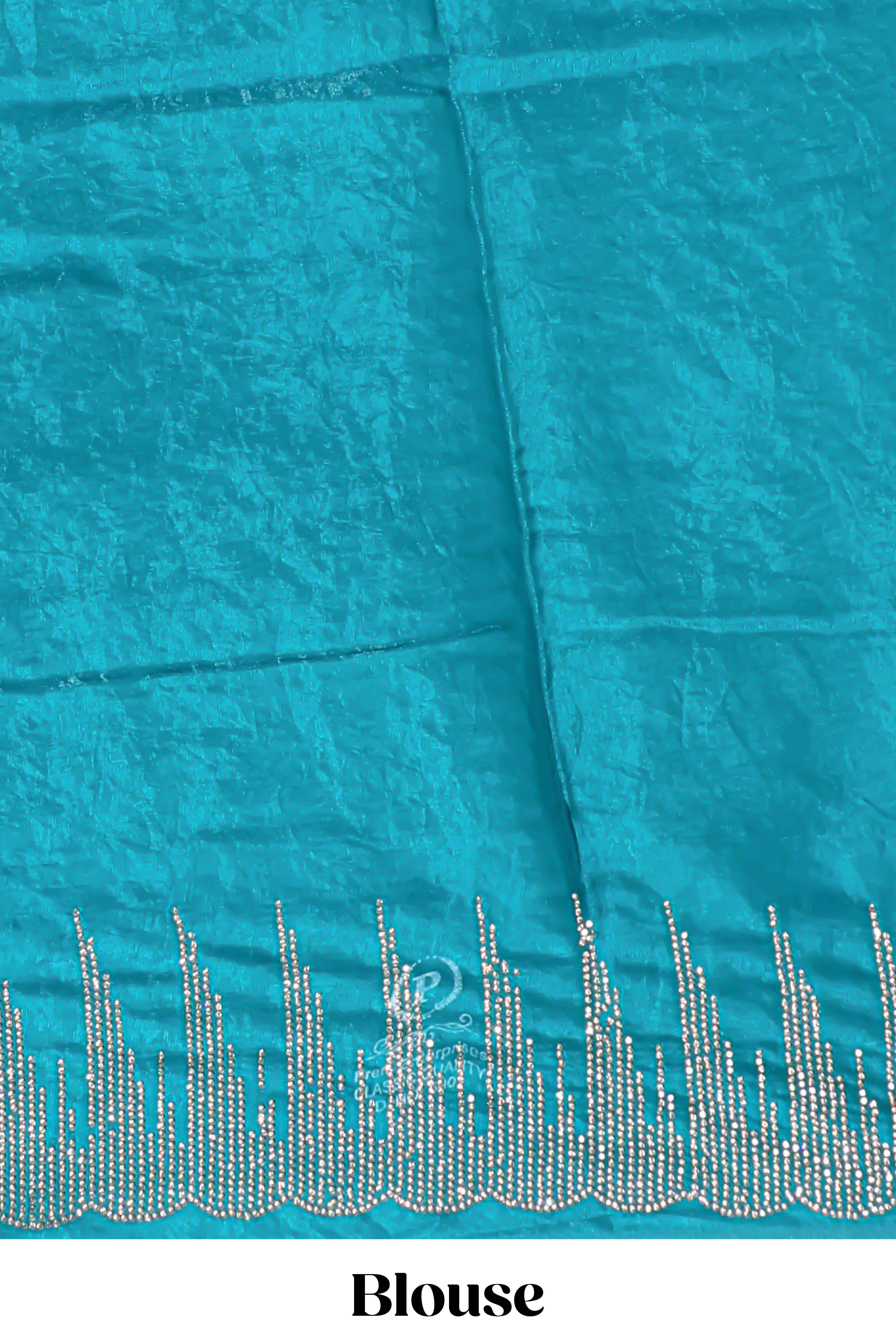 Teal blue saree with sequin striped embroidery scattered butti detailing and embellished border along with matching blouse