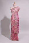 Dusty pink saree with sequin abstract wave embroidery and a detailed embellished border along with matching blouse