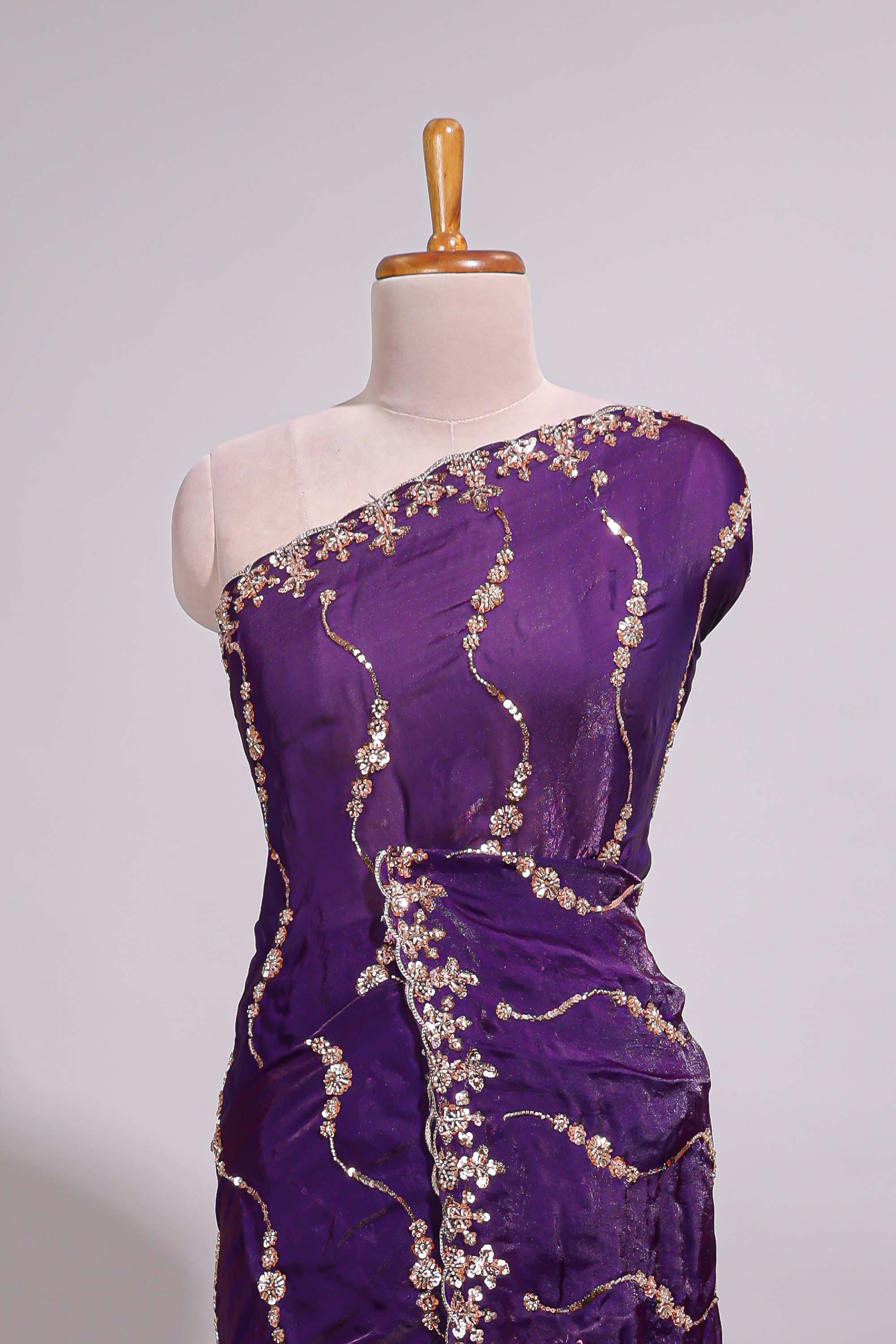 Purple saree with gold sequin wave pattern floral embellished border and matching designer pallu along with work blouse