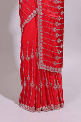 Red saree with silver vertical sequin lines floral motifs embellished border and matching pallu detailing along with matching blouse