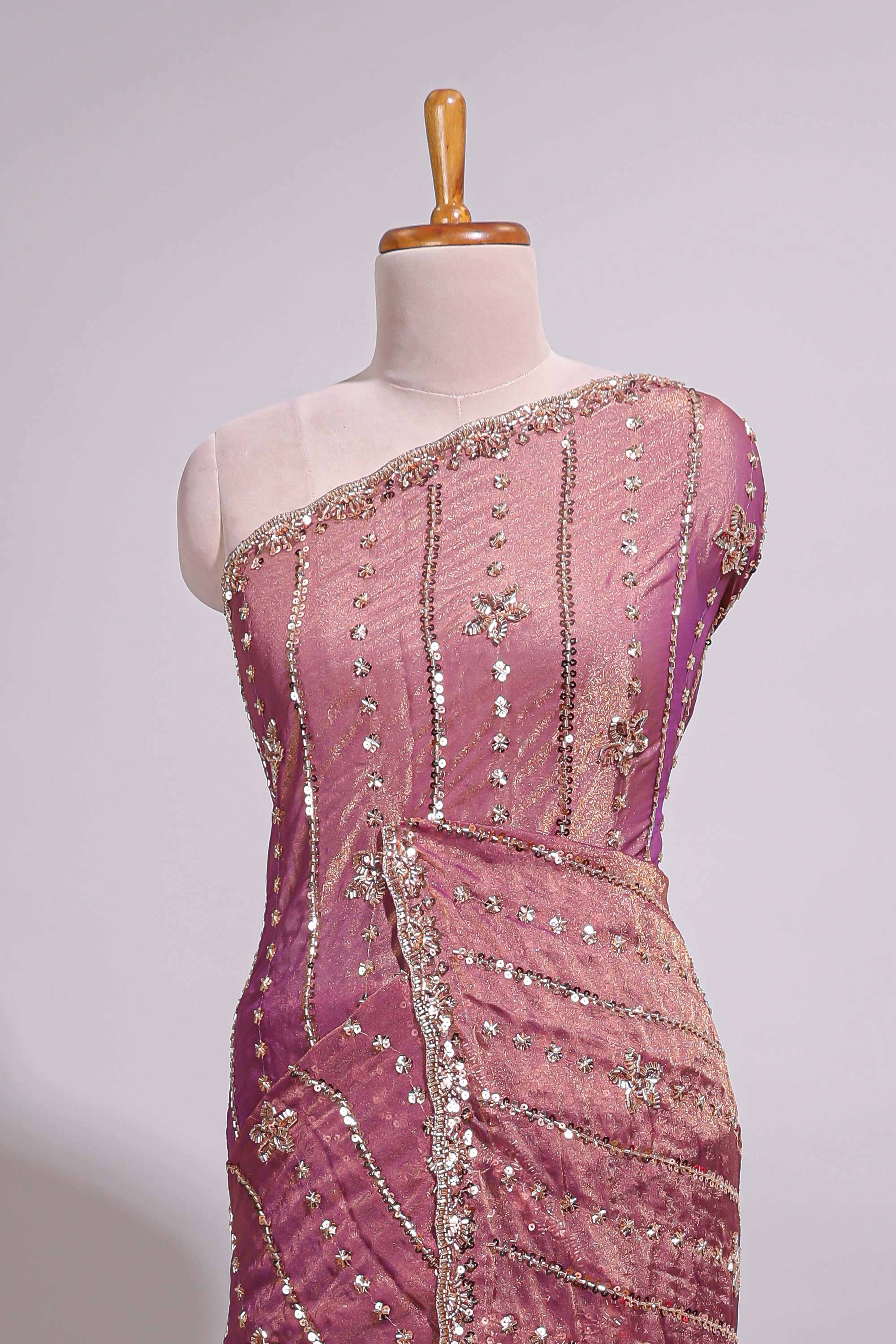 Onion pink saree with silver sequin vertical lines floral motifs embellished border and matching pallu design along with matching blouse