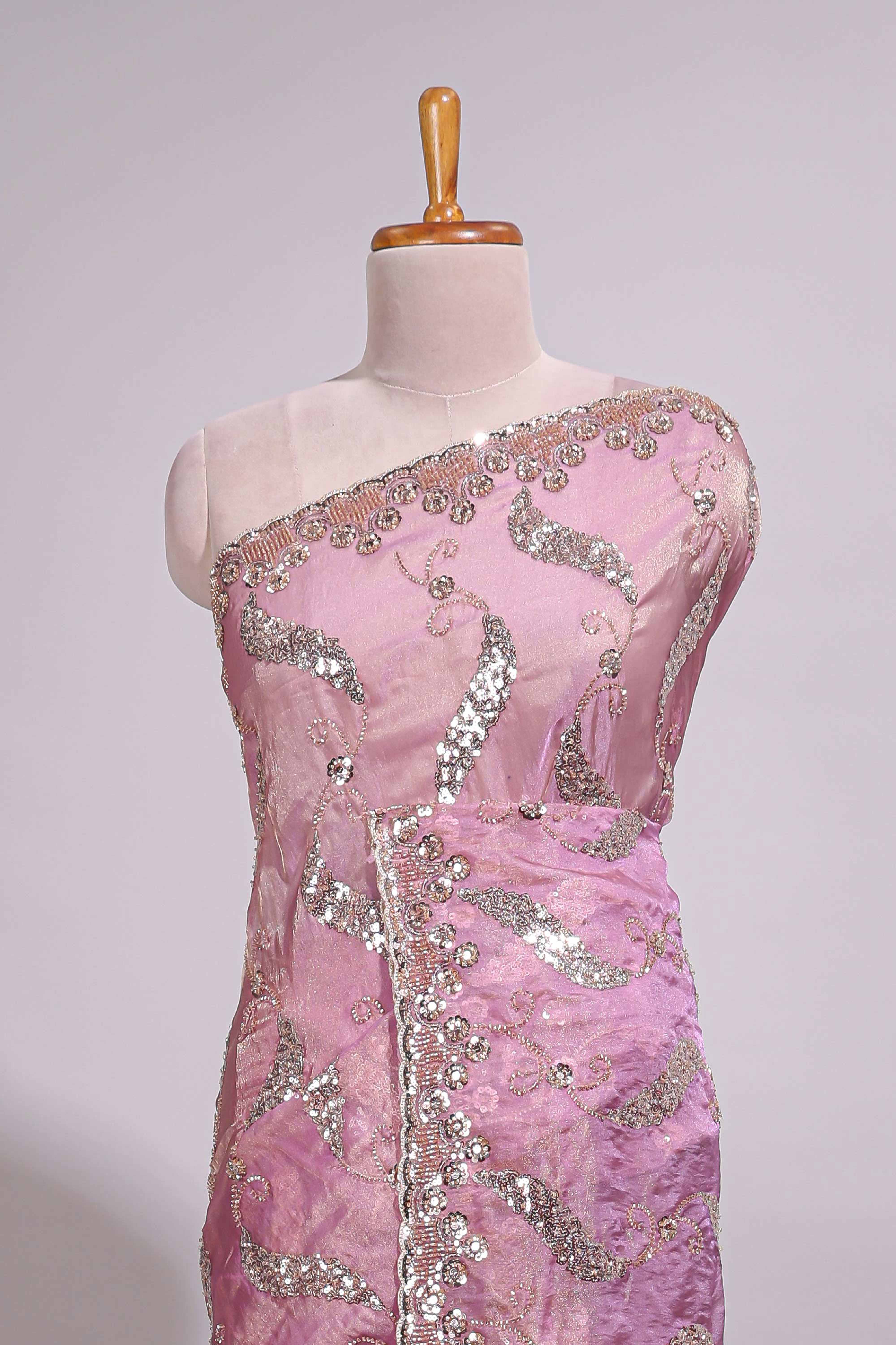 Onion pink saree with sequin abstract wave embroidery and a detailed embellished border along with matching blouse