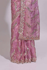 Onion pink saree with sequin abstract wave embroidery and a detailed embellished border along with matching blouse