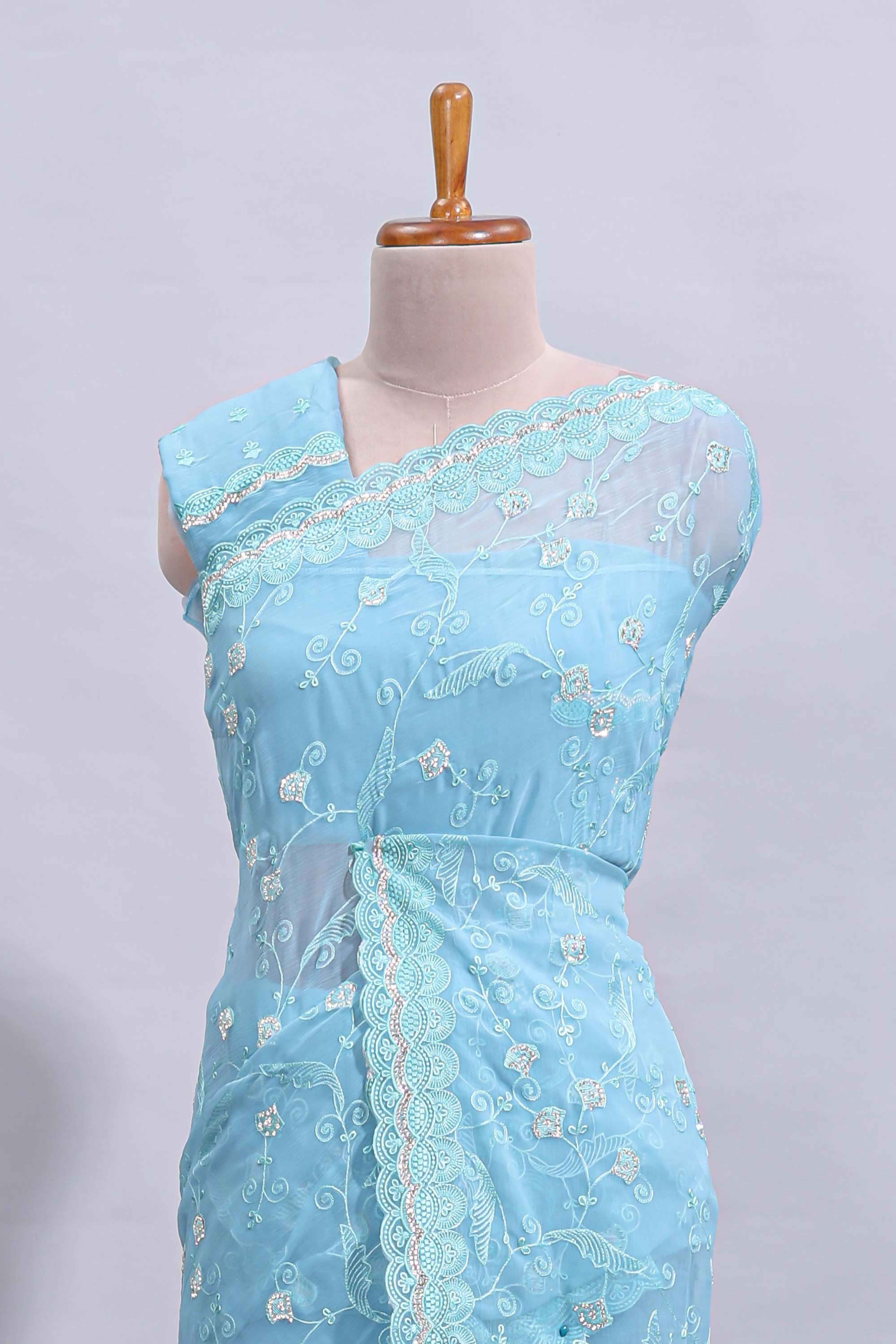 Blue floral design chamki work designer saree with self scallop border and matching blouse