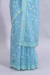 Blue floral design chamki work designer saree with self scallop border and matching blouse