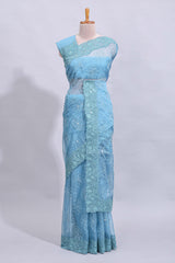 Blue floral design chamki work designer saree with self scallop border and matching blouse