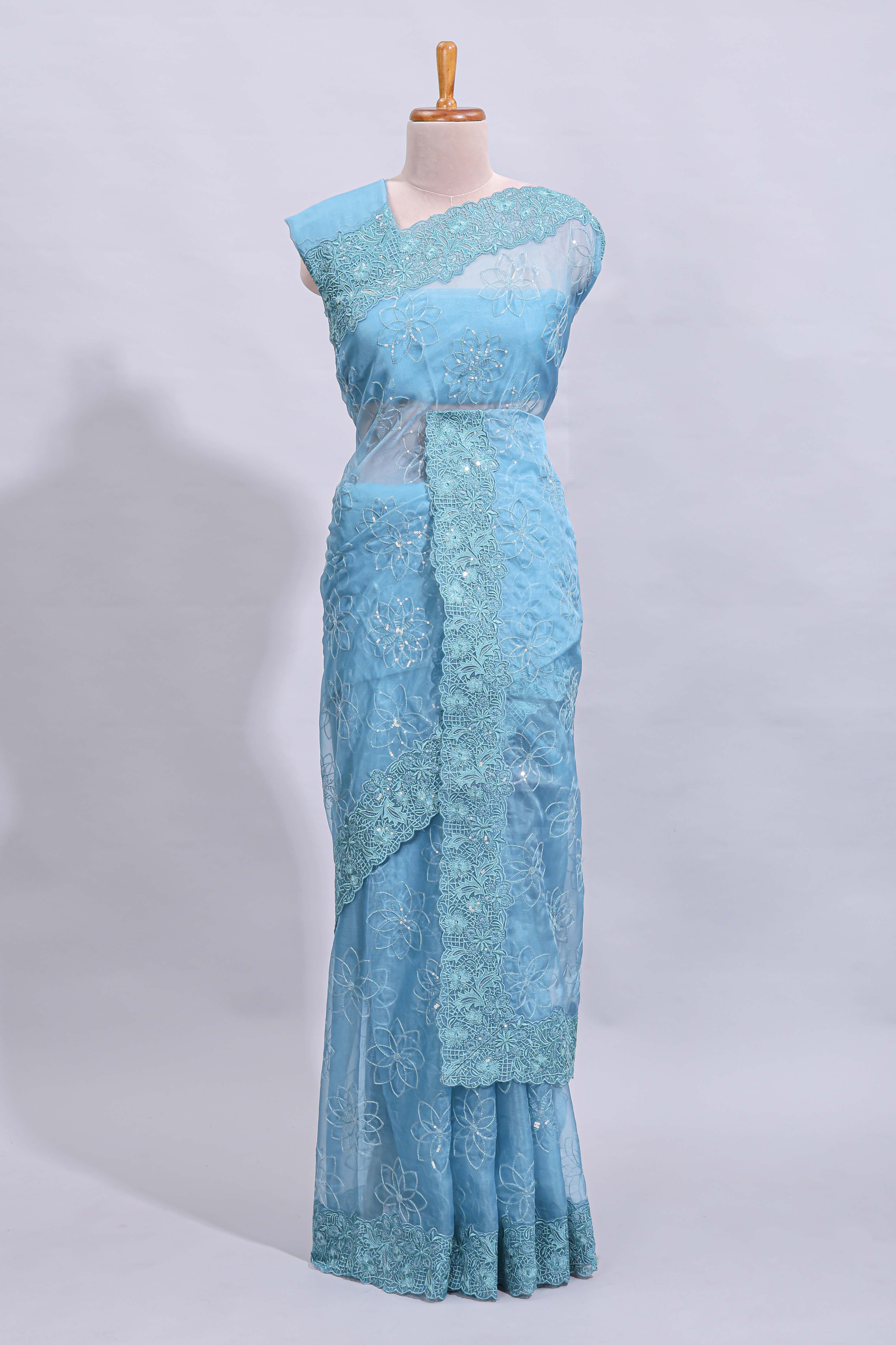 Blue floral design chamki work designer saree with self scallop border and matching blouse