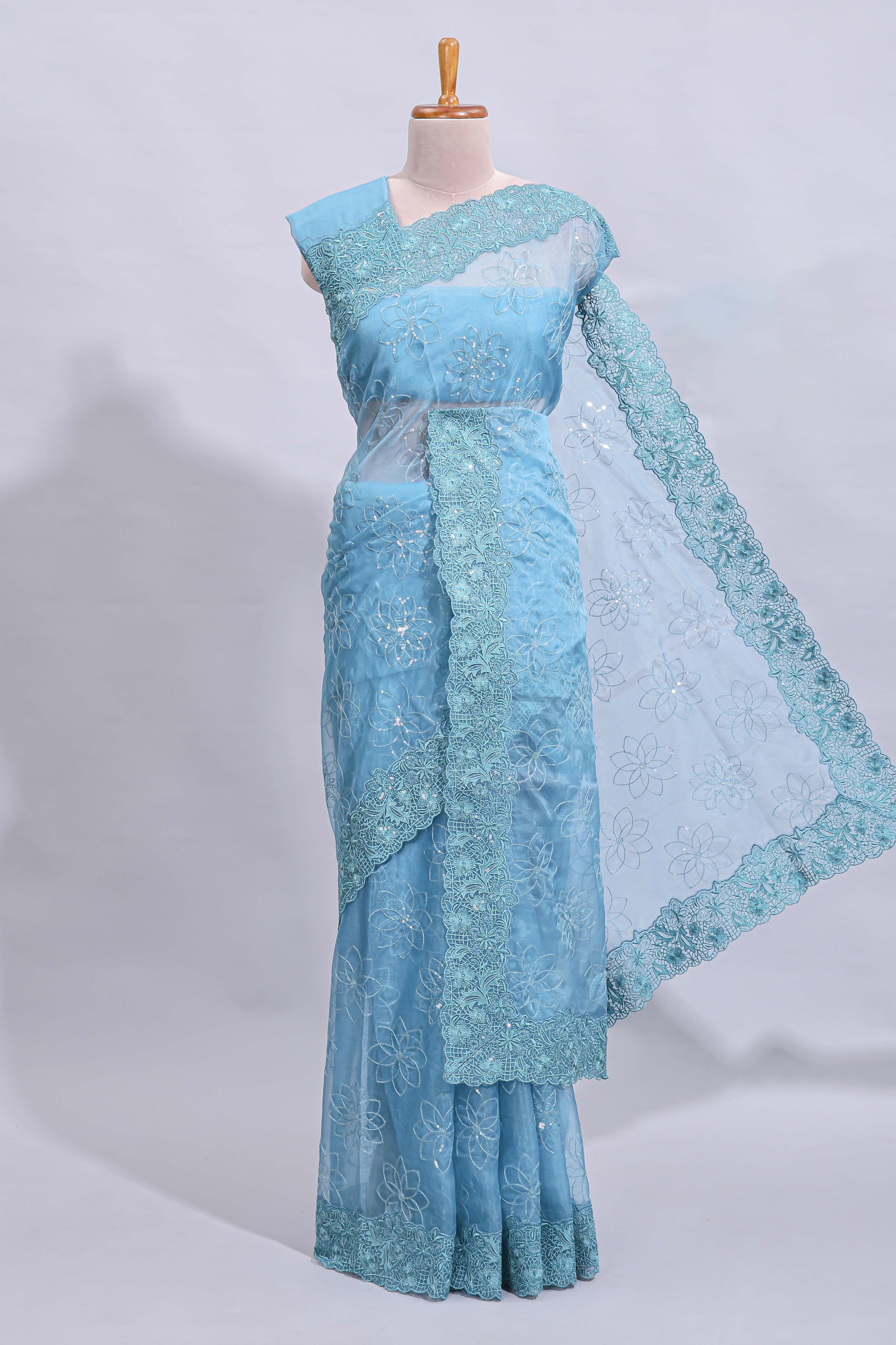 Blue floral design chamki work designer saree with self scallop border and matching blouse