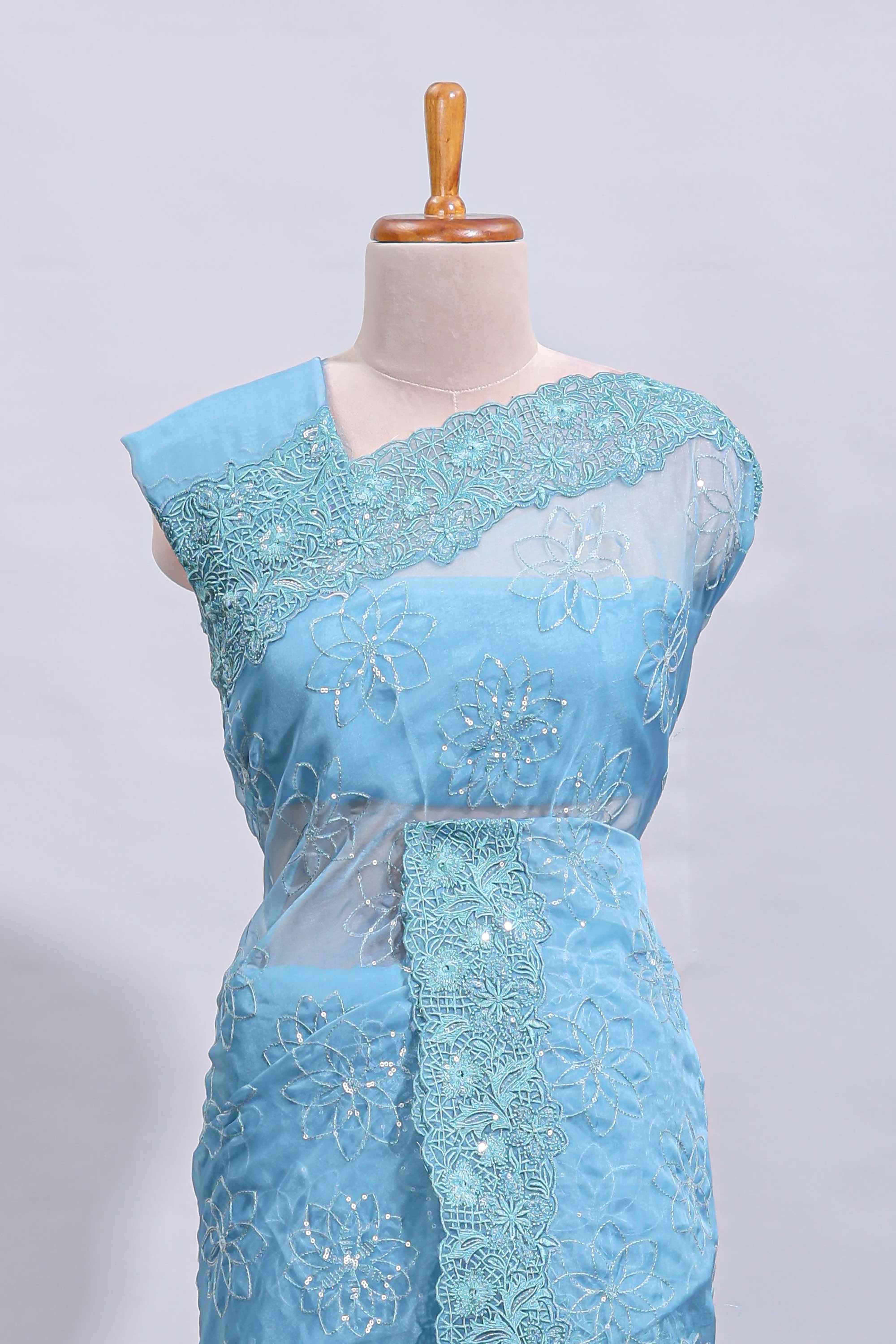 Blue floral design chamki work designer saree with self scallop border and matching blouse