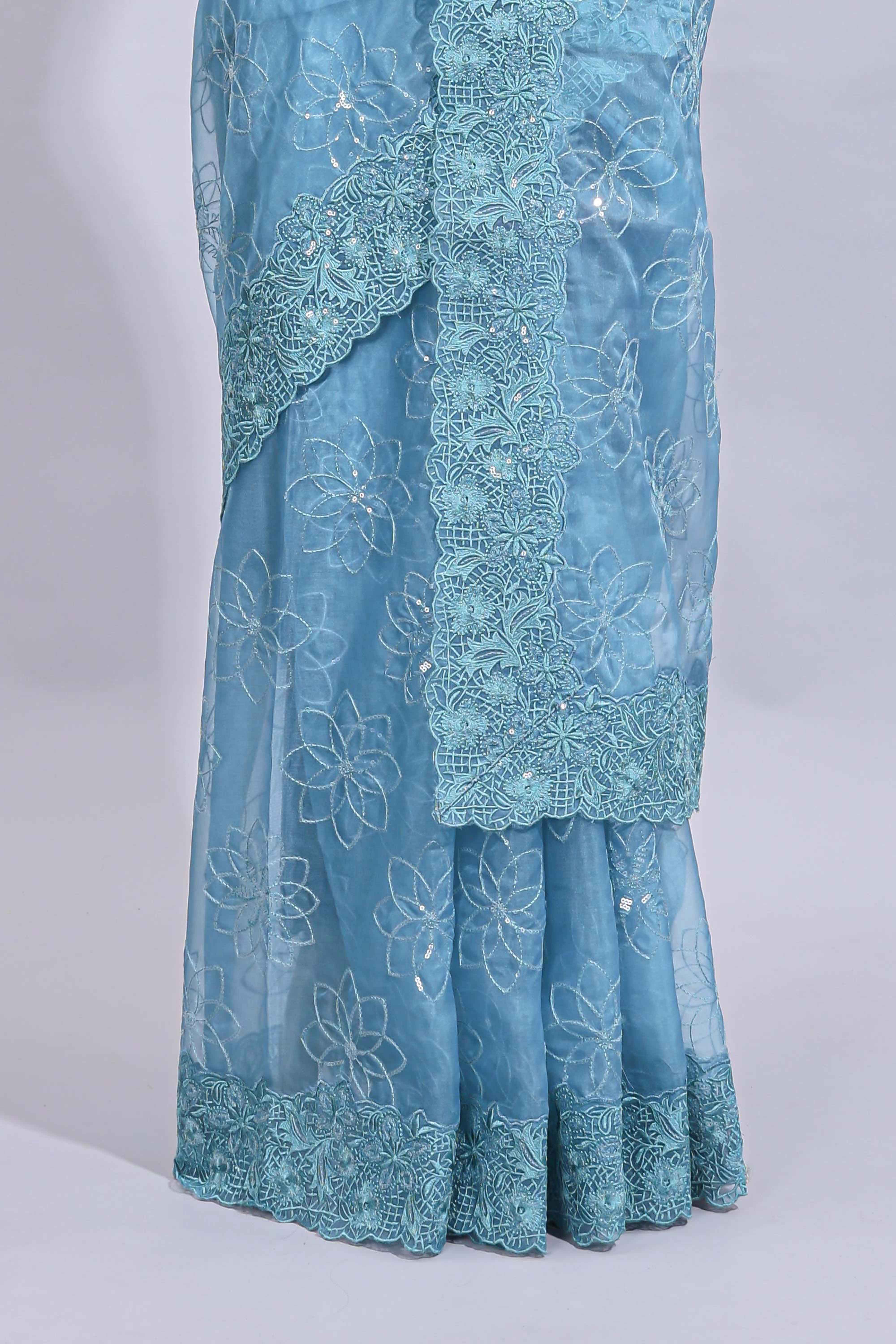 Blue floral design chamki work designer saree with self scallop border and matching blouse