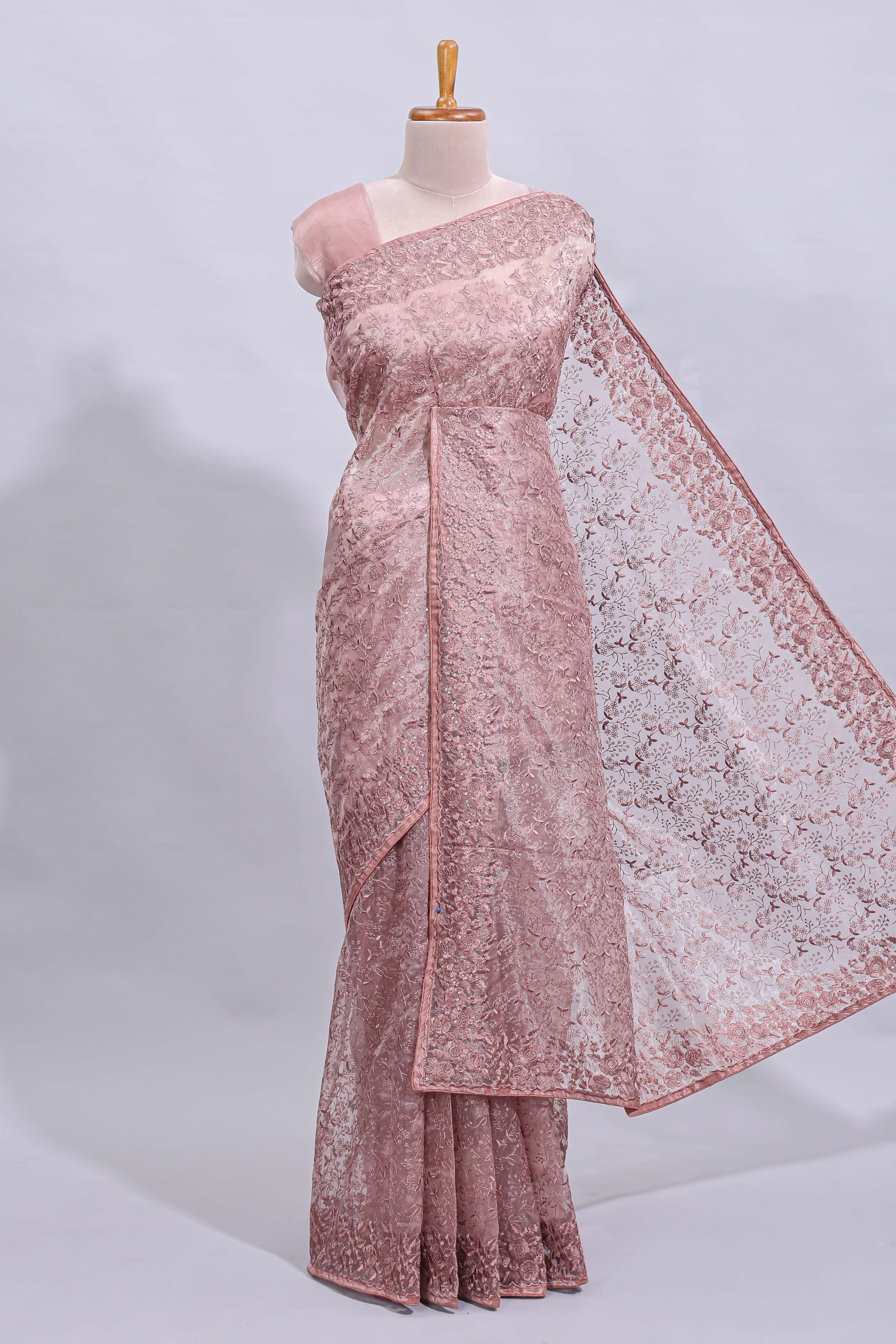 Peach floral design embroidery work designer saree with self border and matching blouse