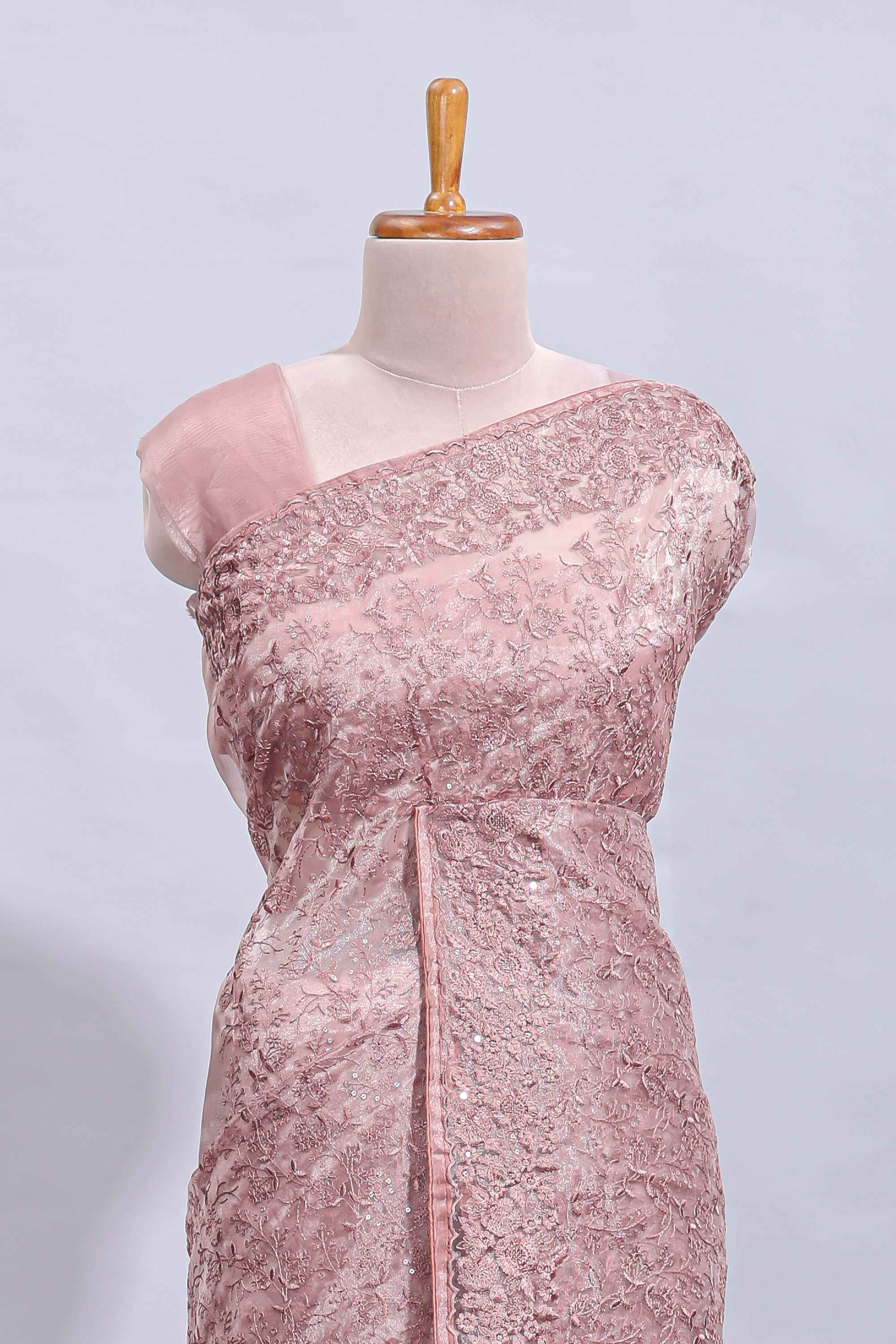 Peach floral design embroidery work designer saree with self border and matching blouse