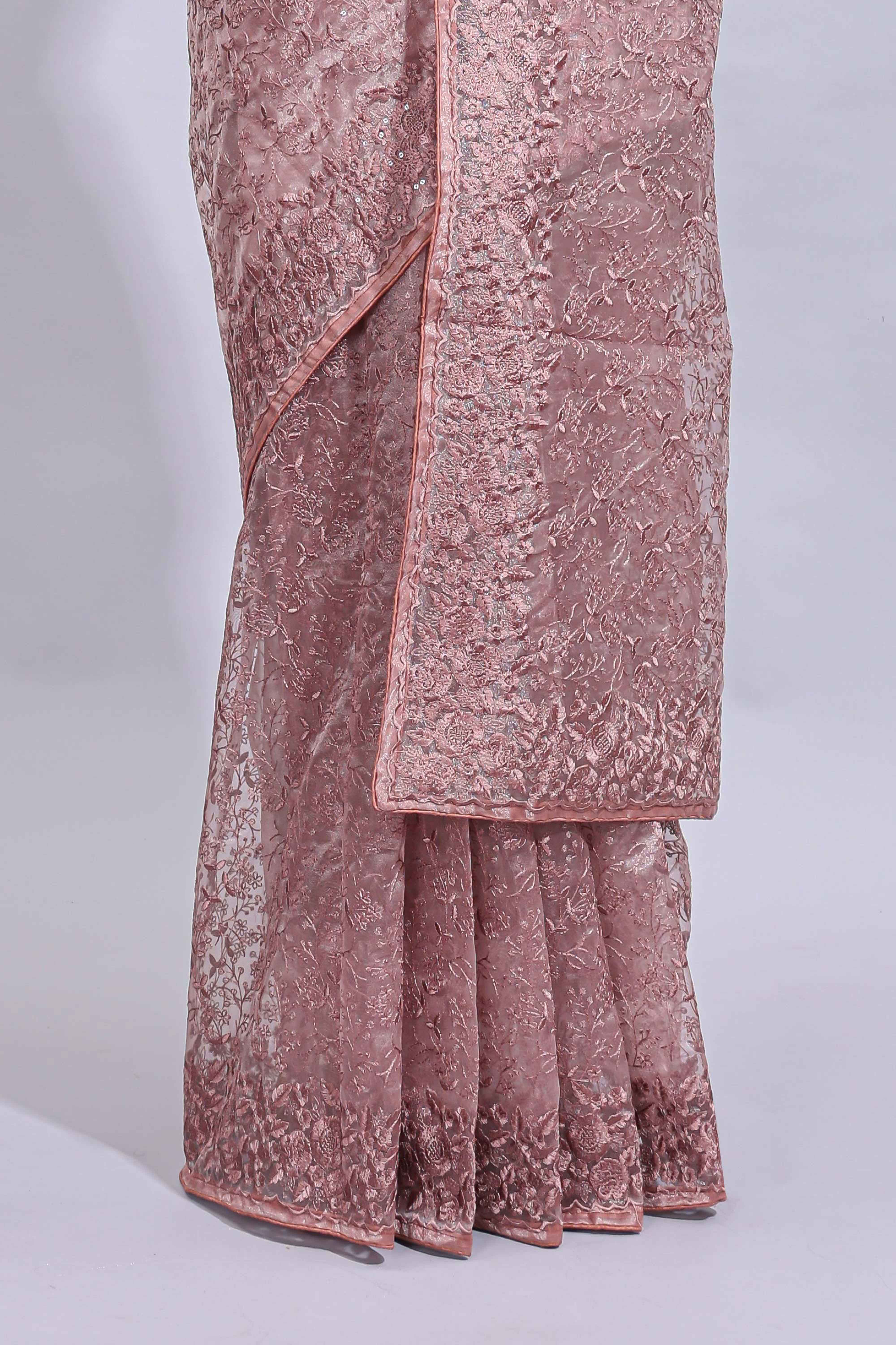Peach floral design embroidery work designer saree with self border and matching blouse