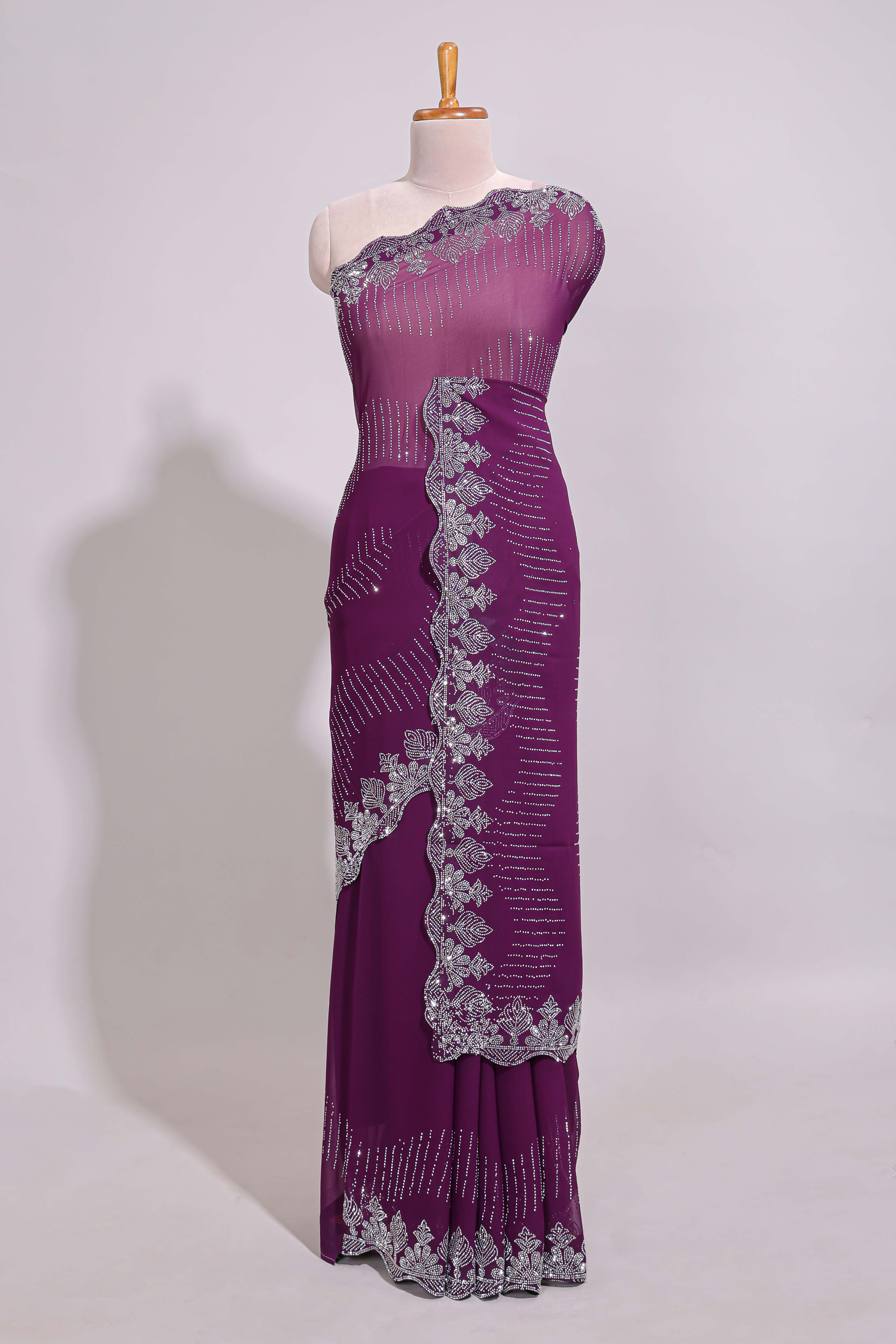 Purple saree with silver sequin wave patternembellished scallop border and matching designer pallu along with work blouse