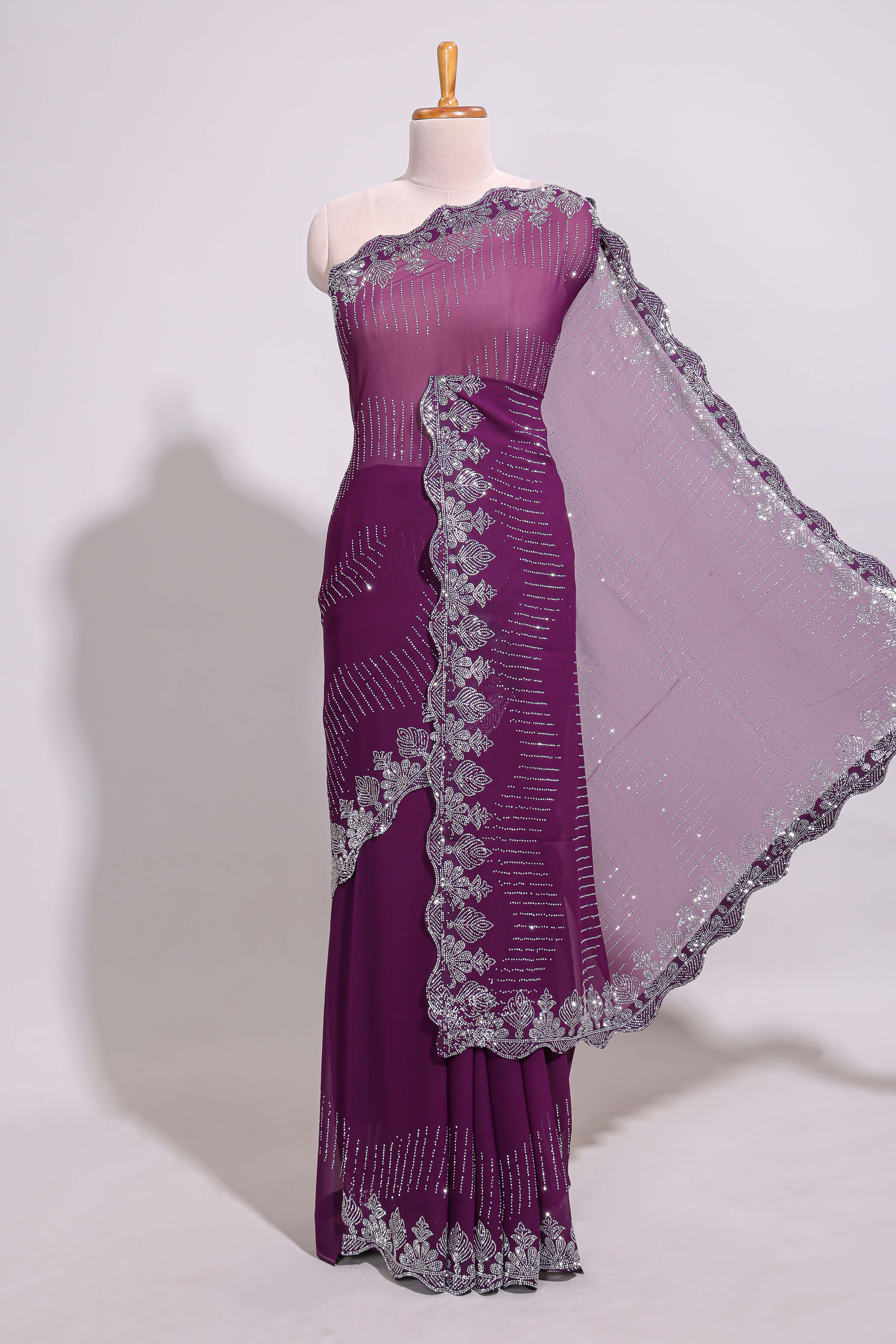 Purple saree with silver sequin wave patternembellished scallop border and matching designer pallu along with work blouse