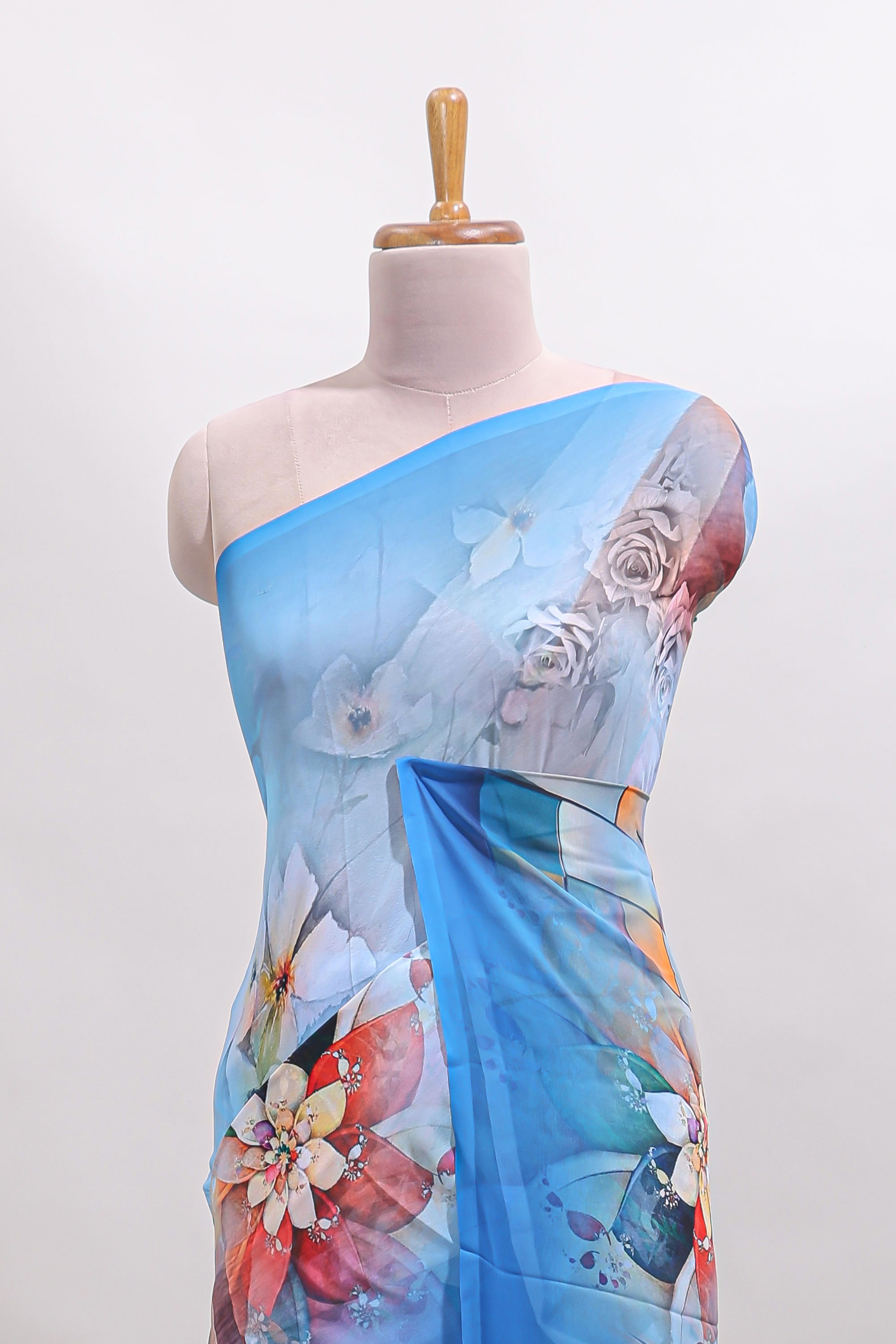 Borderless blue digital floral design georgette saree with matching printed blouse