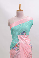 urquiose green and pink dual shade floral design georgette saree with contrast zari border and blouse