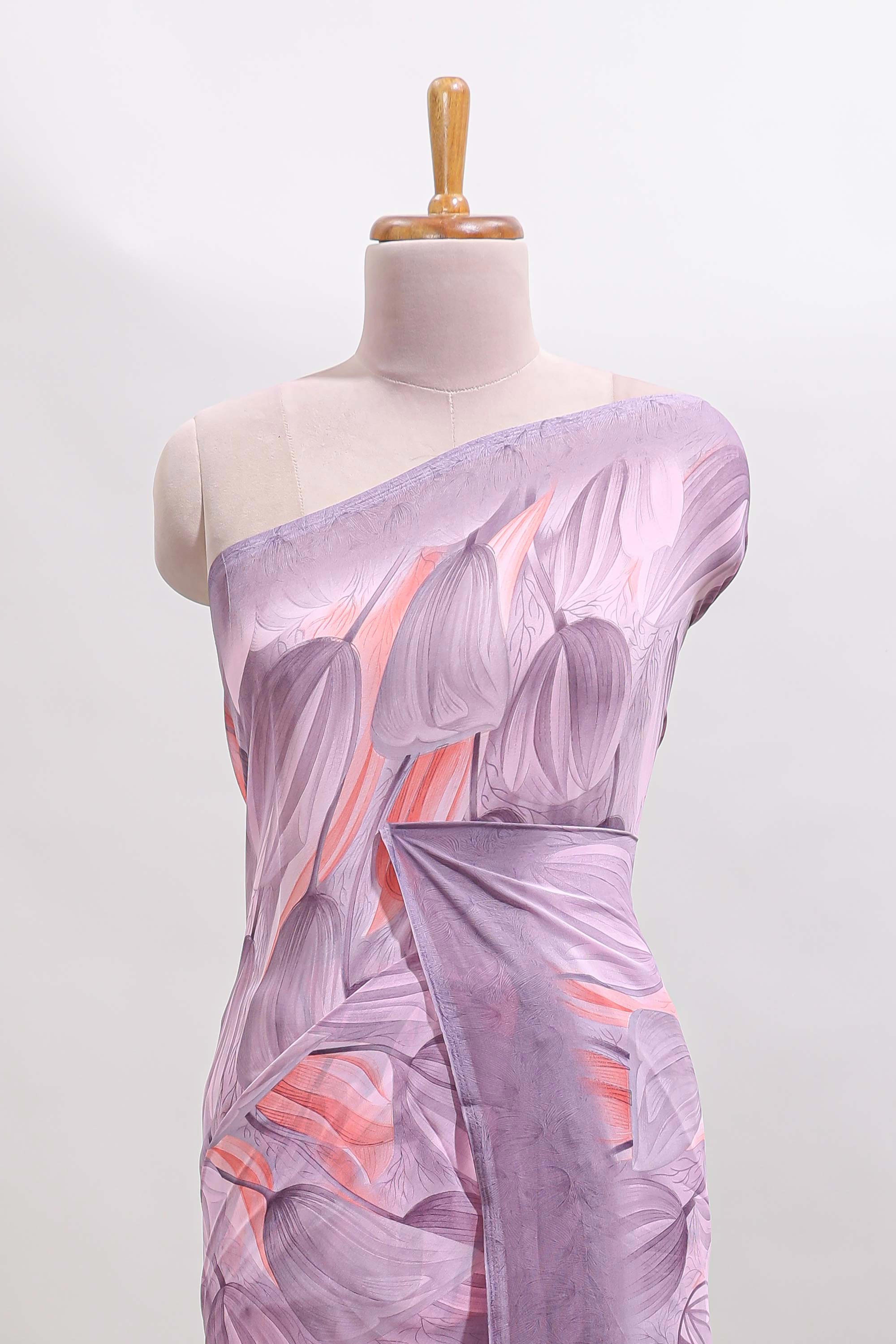 Electric lavender floral design georgette saree with self border and matching blouse