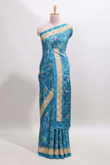 Blue floral design georgette saree with contrast border and matching blouse