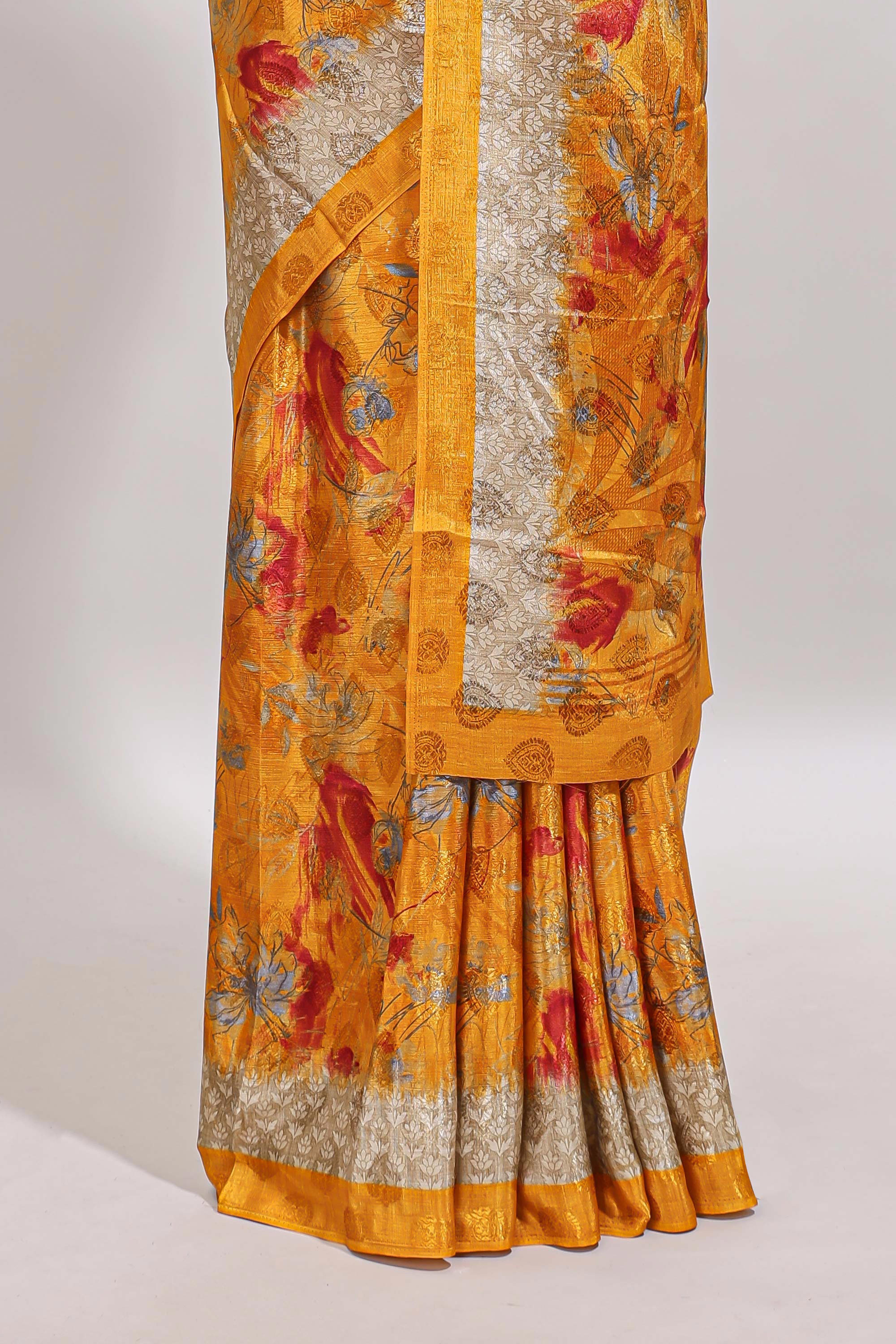 Golden yellow floral design georgette saree with contrast border and matching blouse