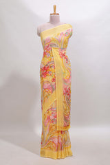 Yellow floral design georgette saree with self border and matching blouse