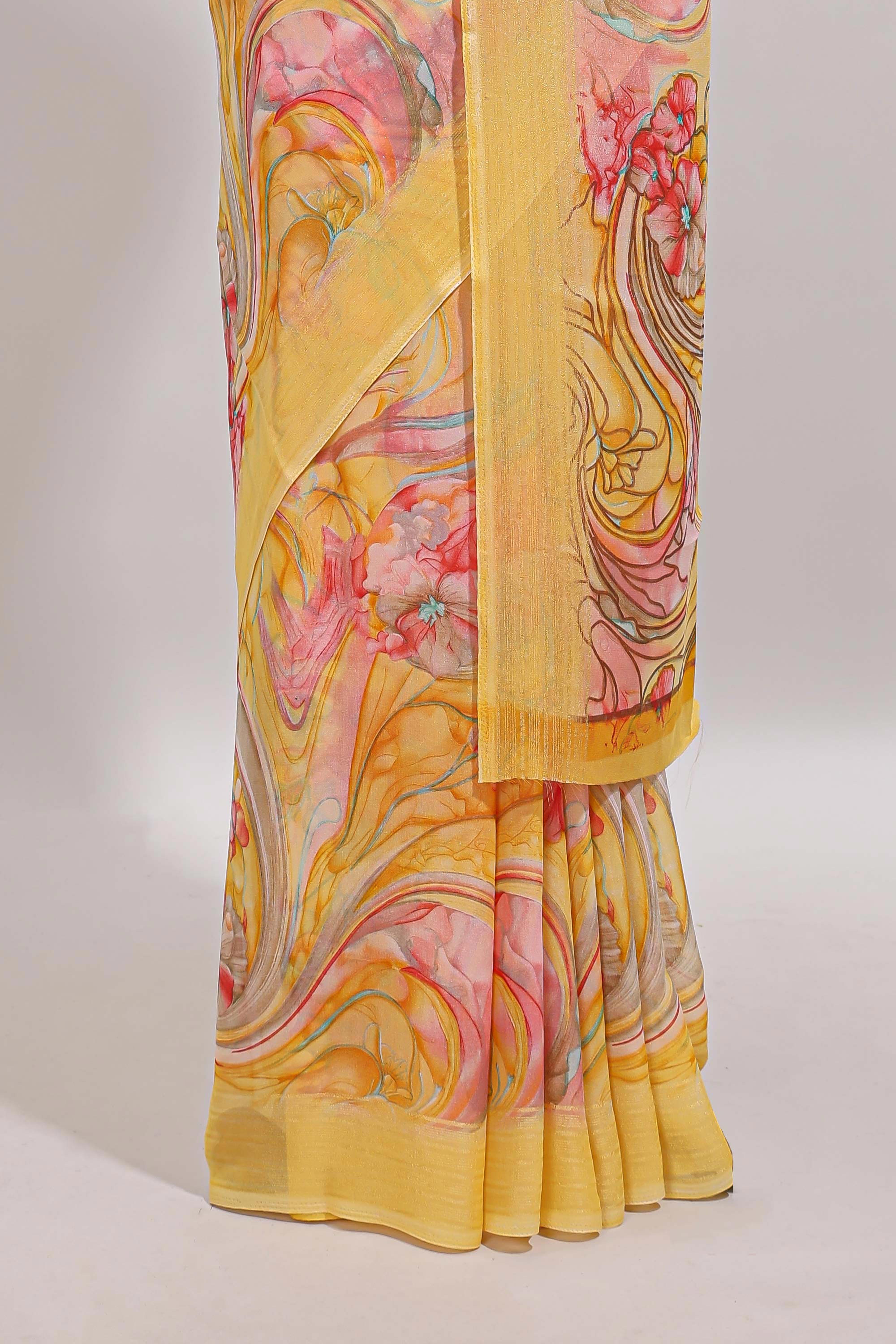 Yellow floral design georgette saree with self border and matching blouse