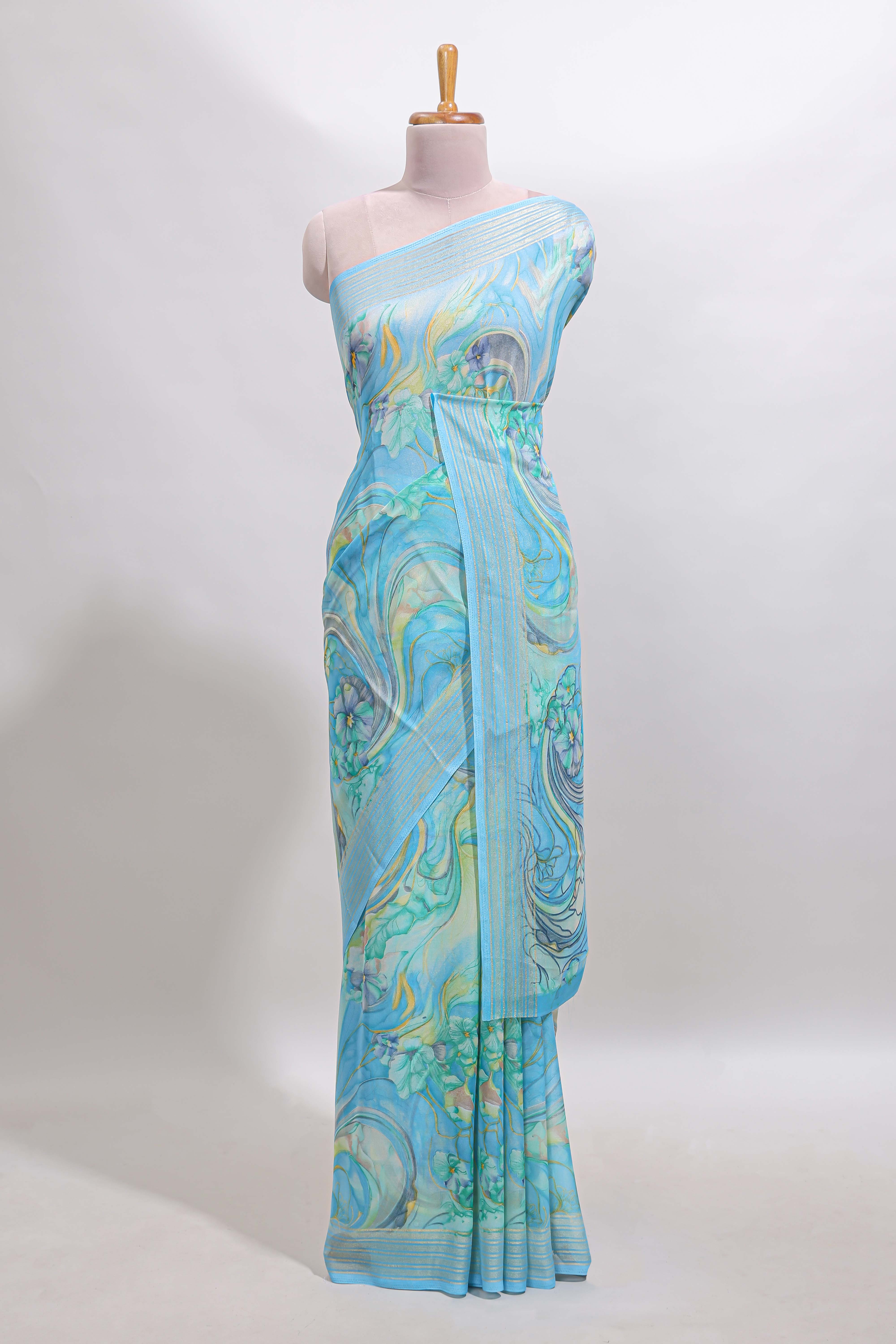 Blue floral design georgette saree with self border and matching blouse