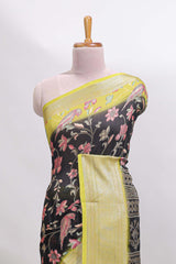 Black floral design georgette saree with contrast border and motifs blouse