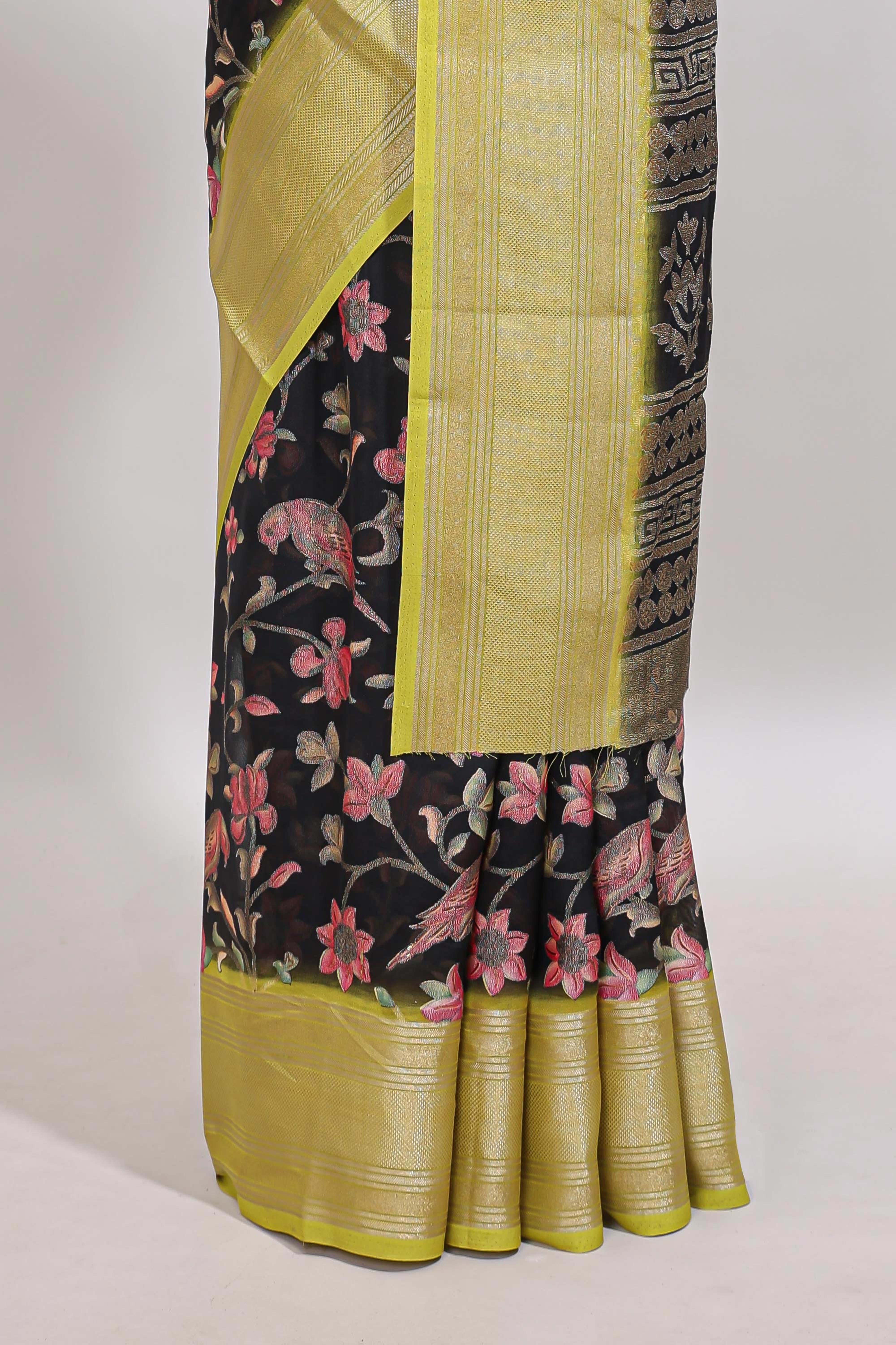 Black floral design georgette saree with contrast border and motifs blouse