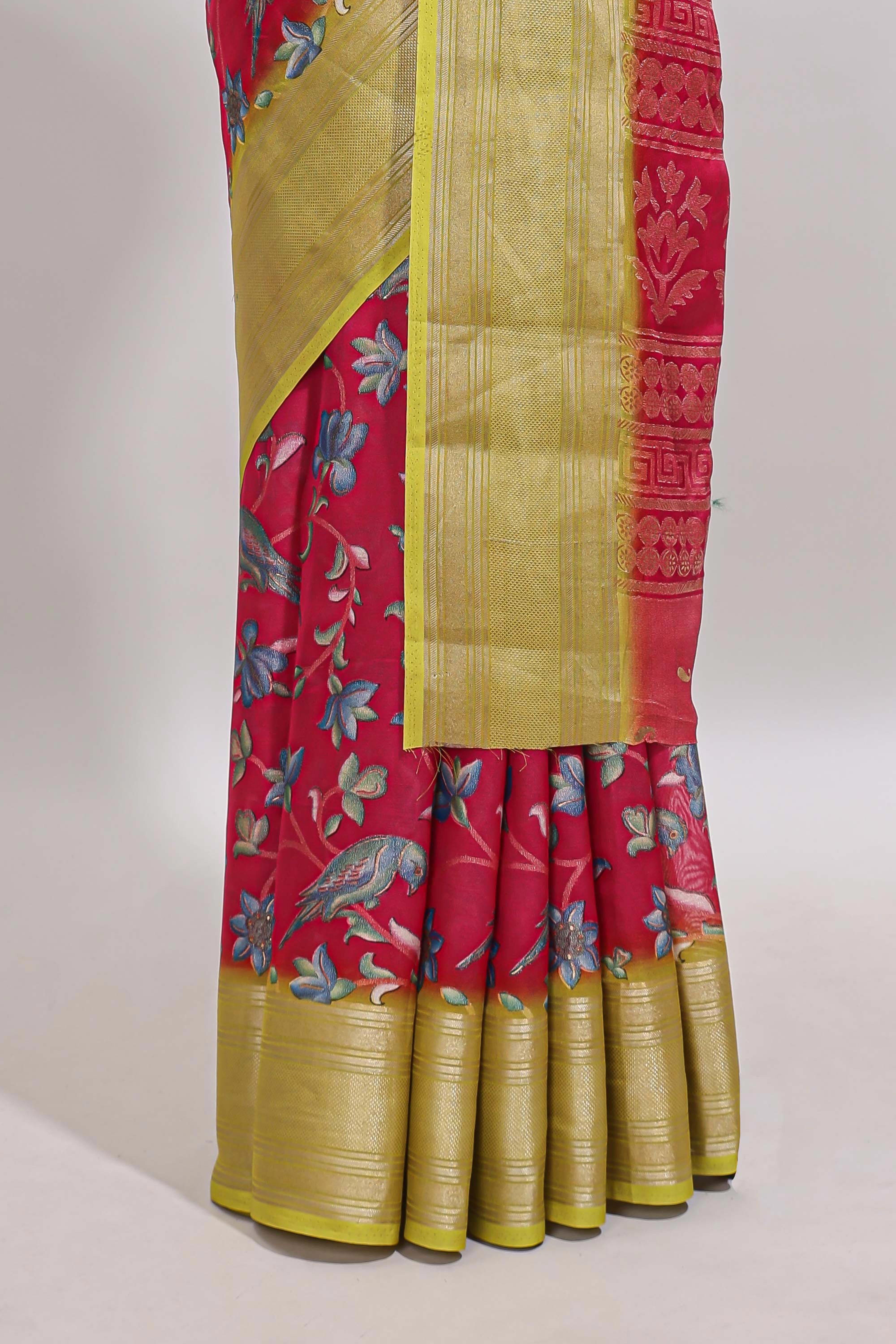 Pink floral design georgette saree with contrast border and motifs blouse