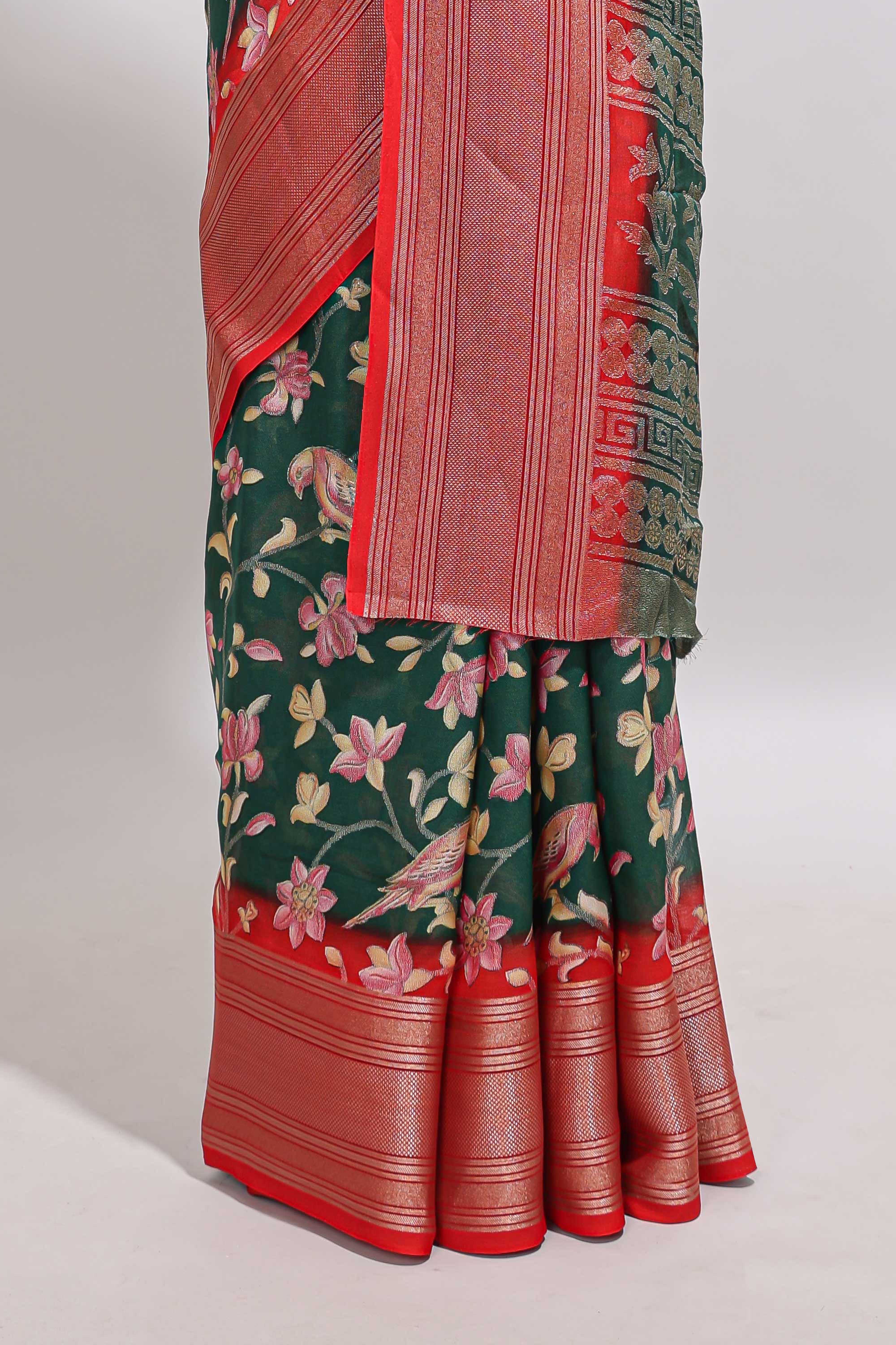 Green floral design georgette saree with contrast border and motifs blouse