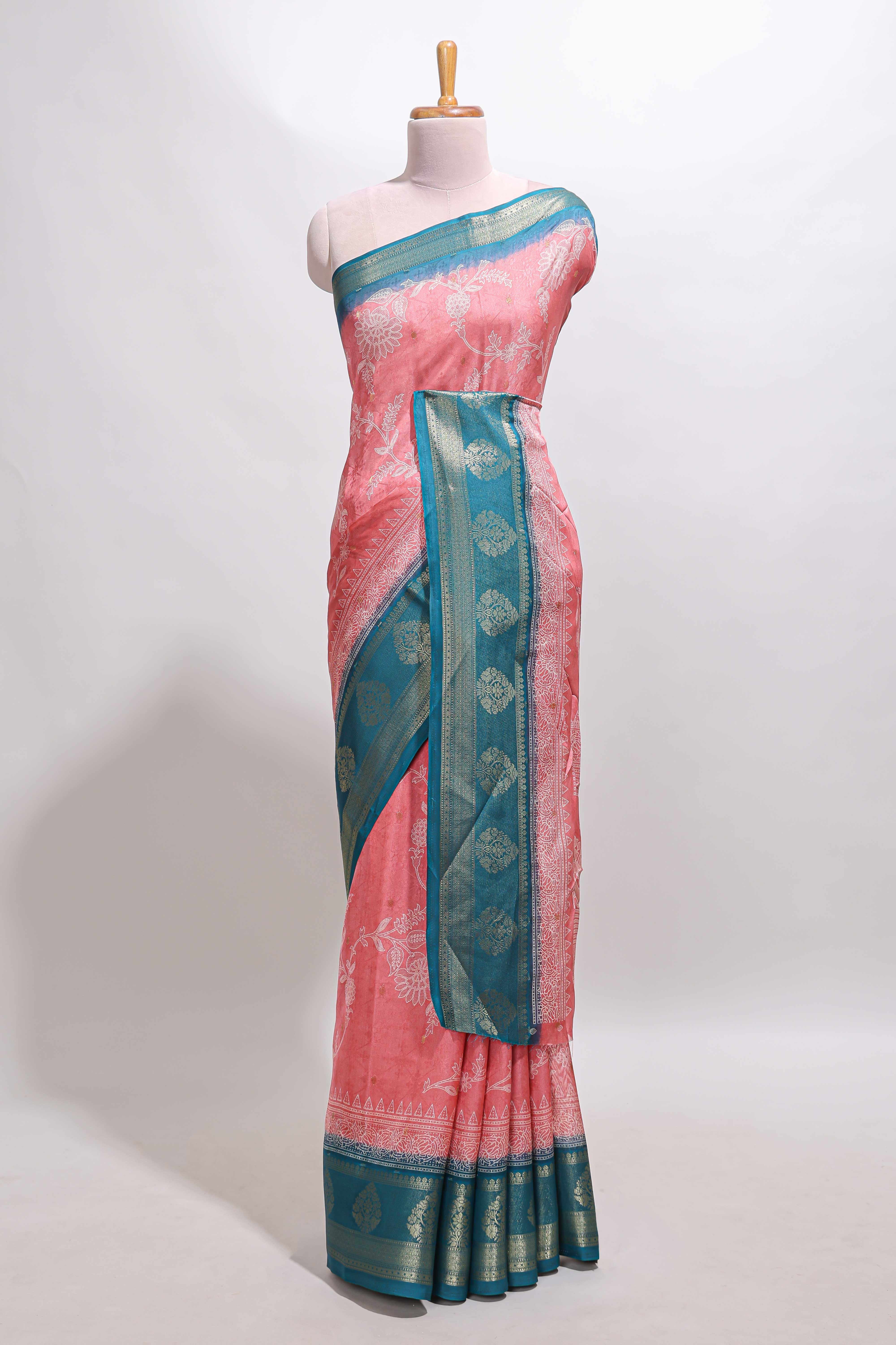 Pink floral design georgette saree with contrast border and motifs blouse