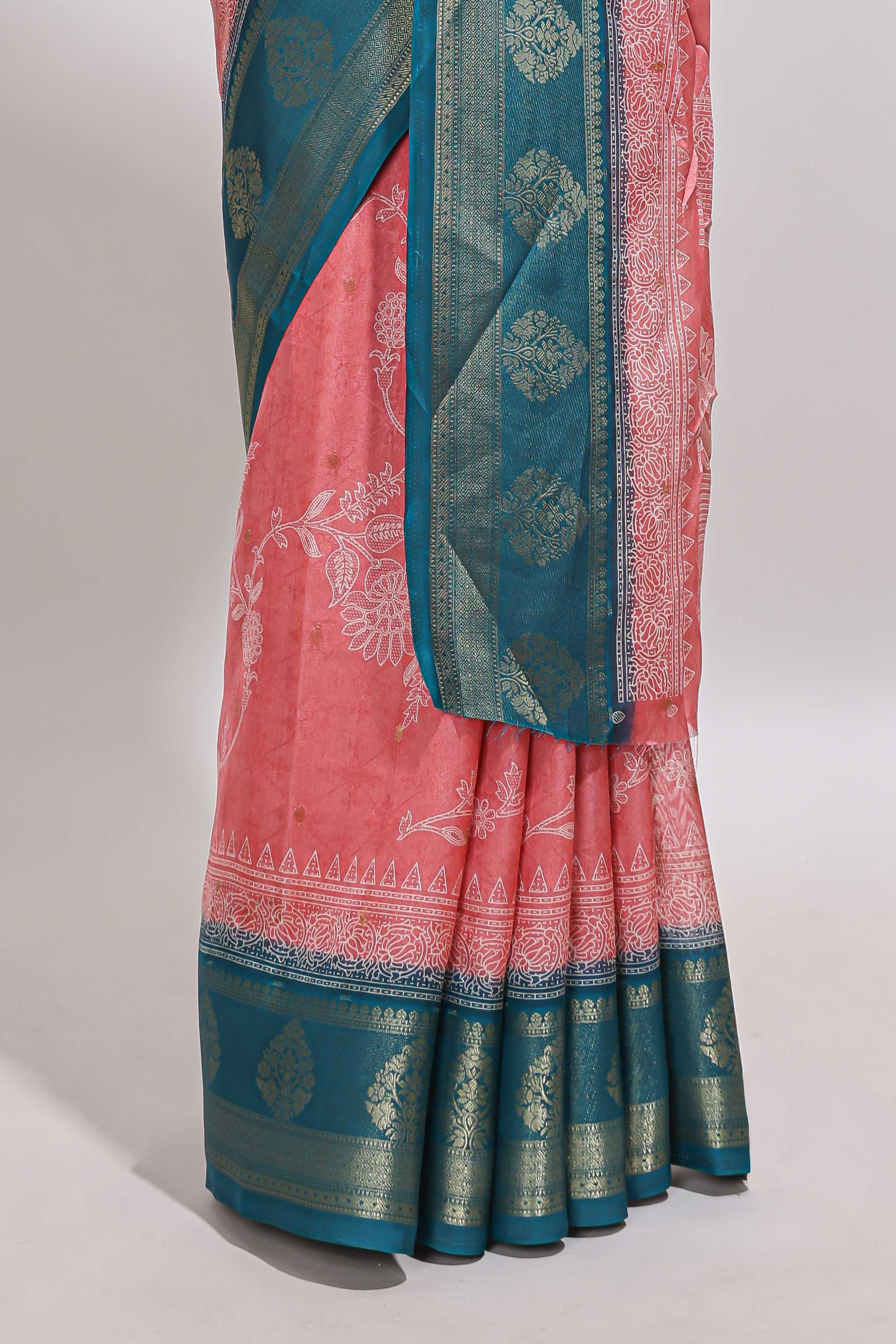 Pink floral design georgette saree with contrast border and motifs blouse