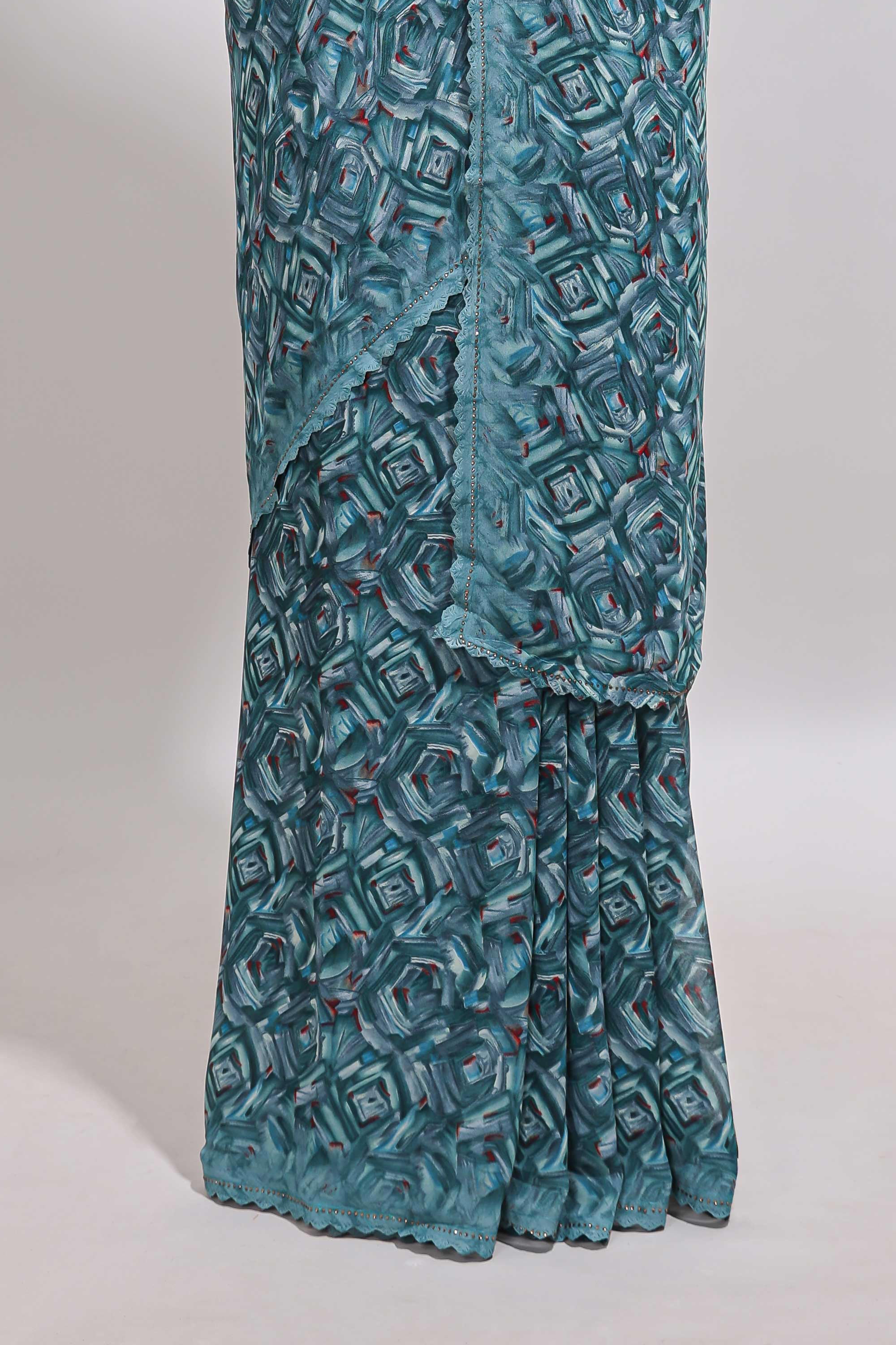 Turquoise blue geometirc digital print georgette saree with self scallop border and matching blouse