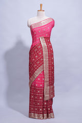 Rani pink double shaded zari checks georgette saree with small zari border and self pallu along with matching zari buttas blouse piece