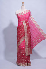 Rani pink double shaded zari checks georgette saree with small zari border and self pallu along with matching zari buttas blouse piece